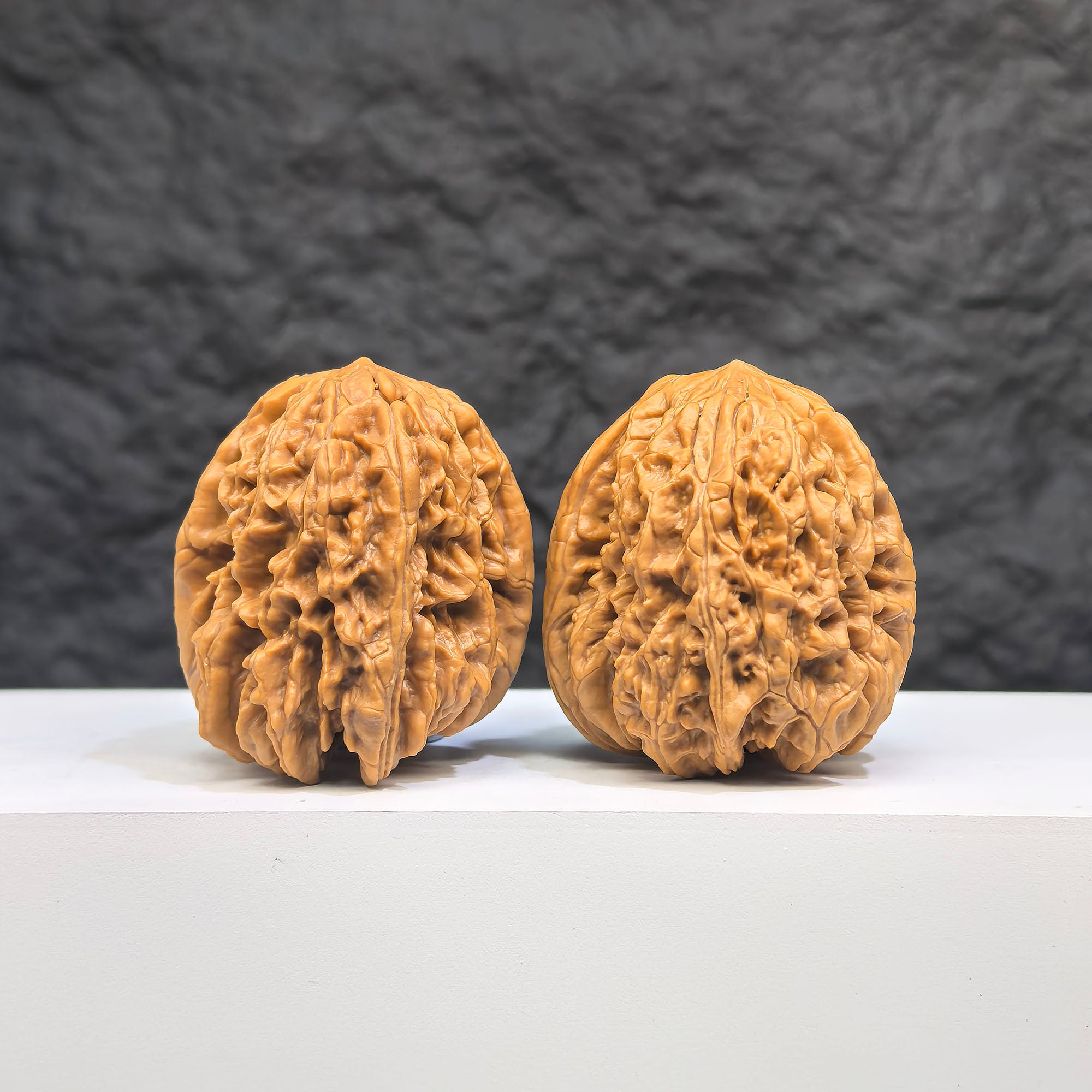 Selected grade Blizzard Wenwan Walnut, 3.8x3.9cm, showing smooth surface and natural wood grain, crafted by Wenwan Art.