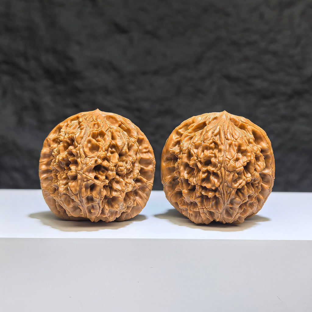 Pair of Classic Scholar Wenwan Walnuts by Wenwan Art, hand-matched water dragon pattern, 40mm spherical shape, traditional Chinese collectible.