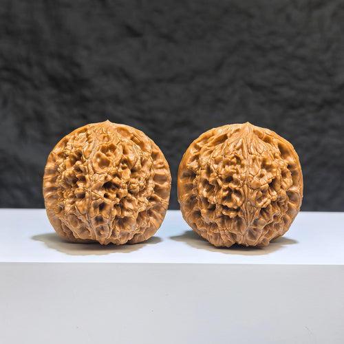 Pair of Classic Scholar Wenwan Walnuts by Wenwan Art, hand-matched water dragon pattern, 40mm spherical shape, traditional Chinese collectible.
