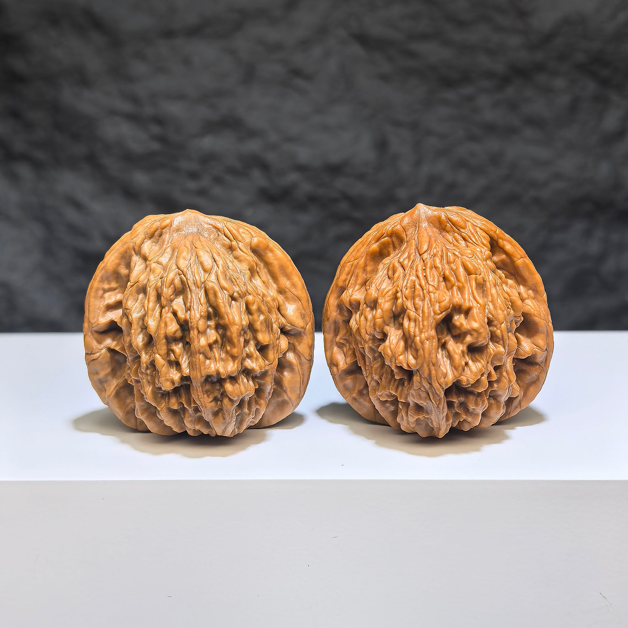 Pair of Wenwan Art Wheat Ear Tiger Head walnuts showcasing detailed tiger head carvings, 38mm size, traditional Chinese craftsmanship.