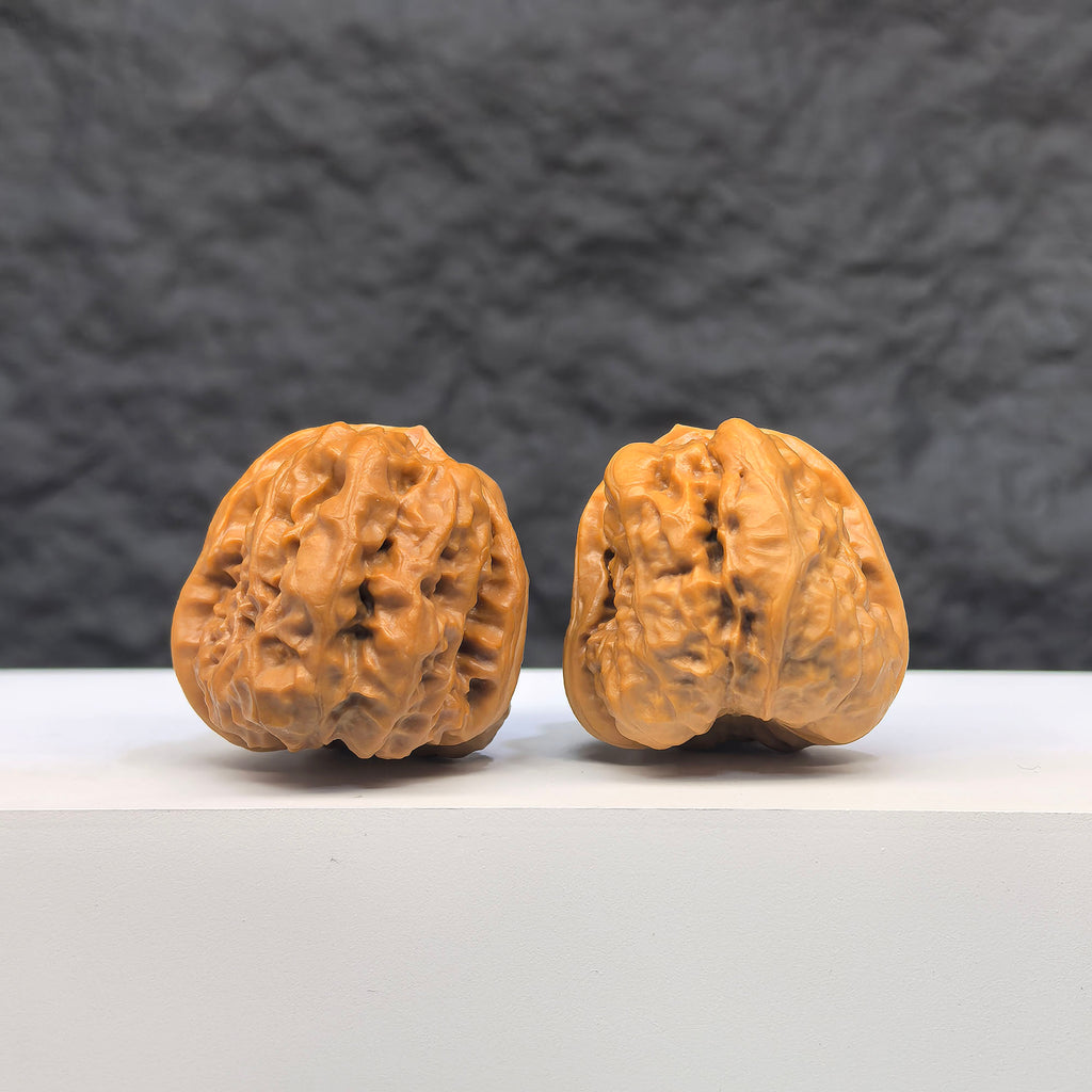 Pair of Toad Crystal Frog Wenwan Walnut carvings from Wenwan Art, featuring detailed toad and frog figures in crystal-like material.