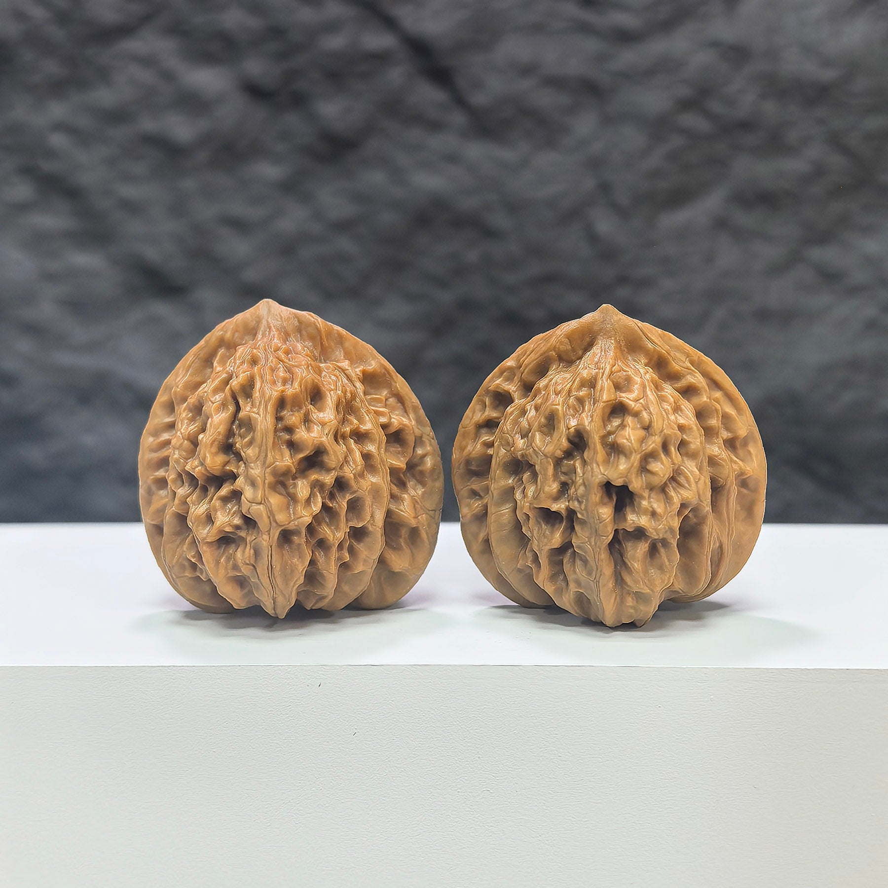 Pair of Peach Heart Xiayunling Wenwan walnuts from Wenwan Art, 38mm x 35mm, featuring natural walnut textures and peach heart design.
