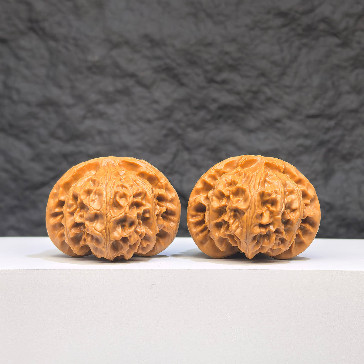 Pair of Palace Lantern Wenwan walnuts from Wenwan Art, 42mm x 41mm, showcasing intricate carvings and traditional craftsmanship.
