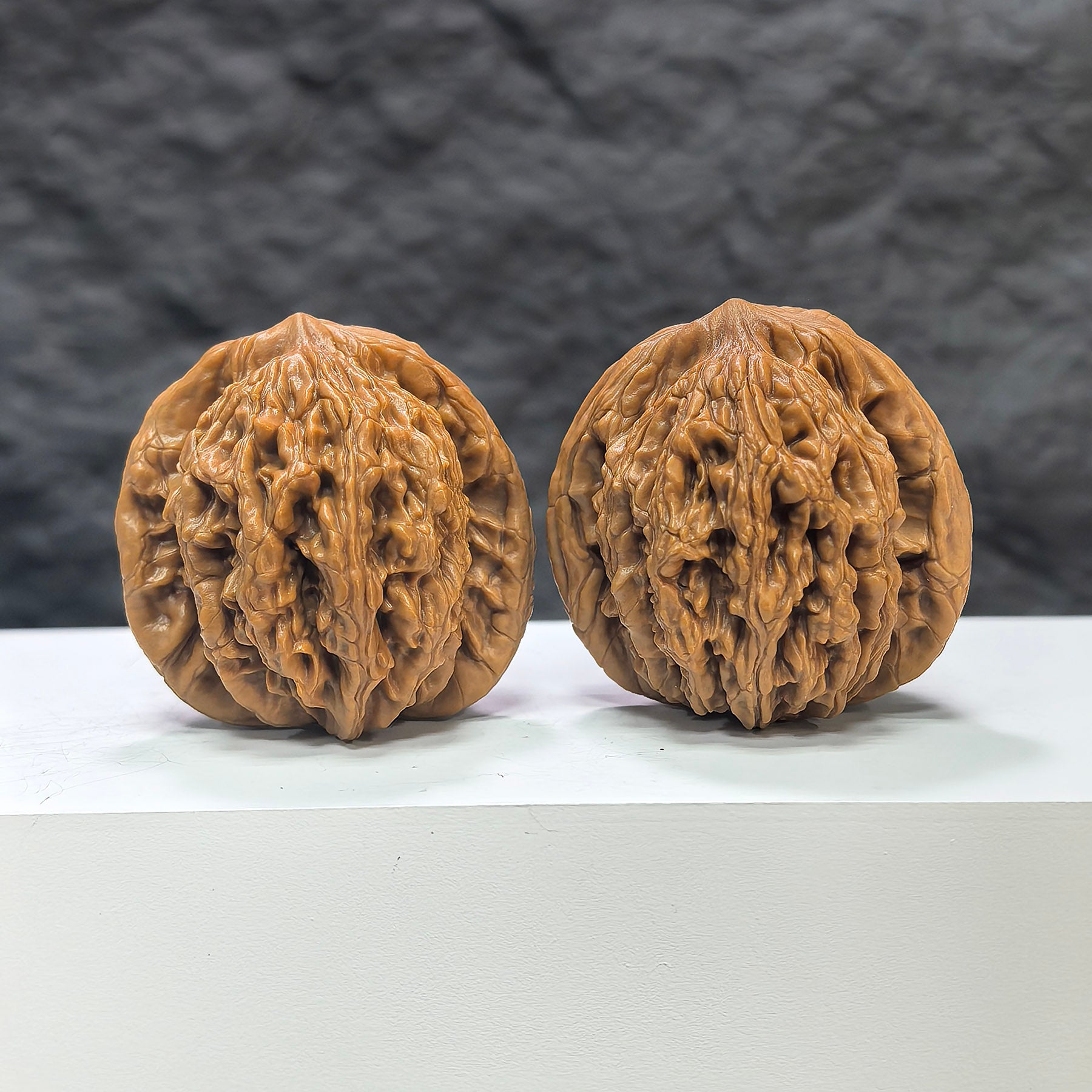 Pair of Wenwan Art Wheat Ear Tiger Head walnuts, 42mm x 49mm, featuring detailed tiger head designs on classic Wenwan walnuts.