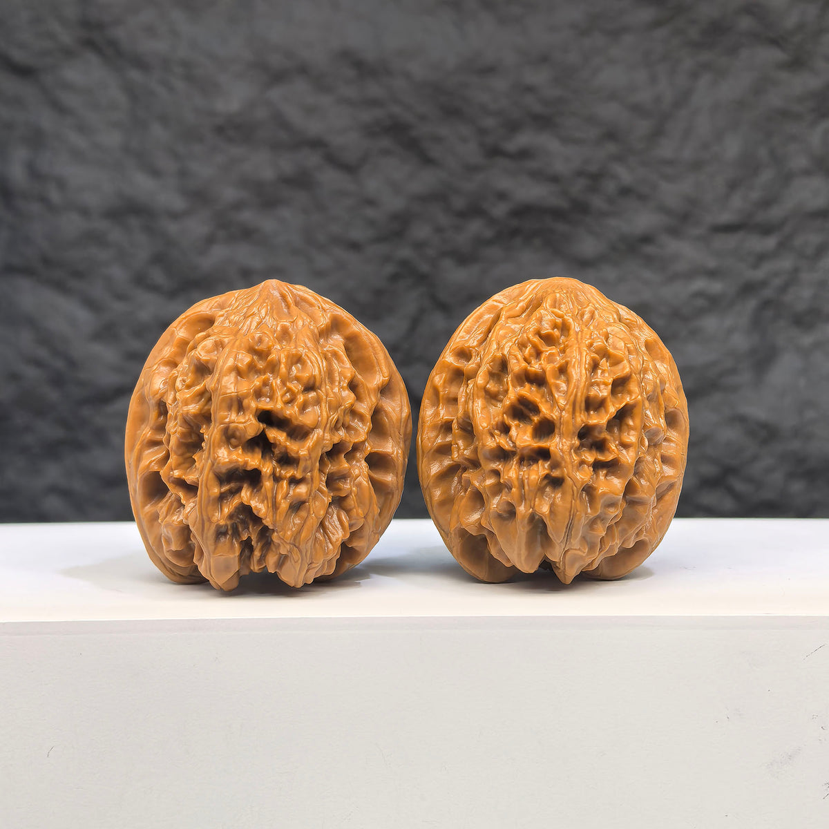 Selected grade Wild Bison Walnut Wenwan Art piece, 3.8cm, featuring smooth, polished surface and natural wood grain details.