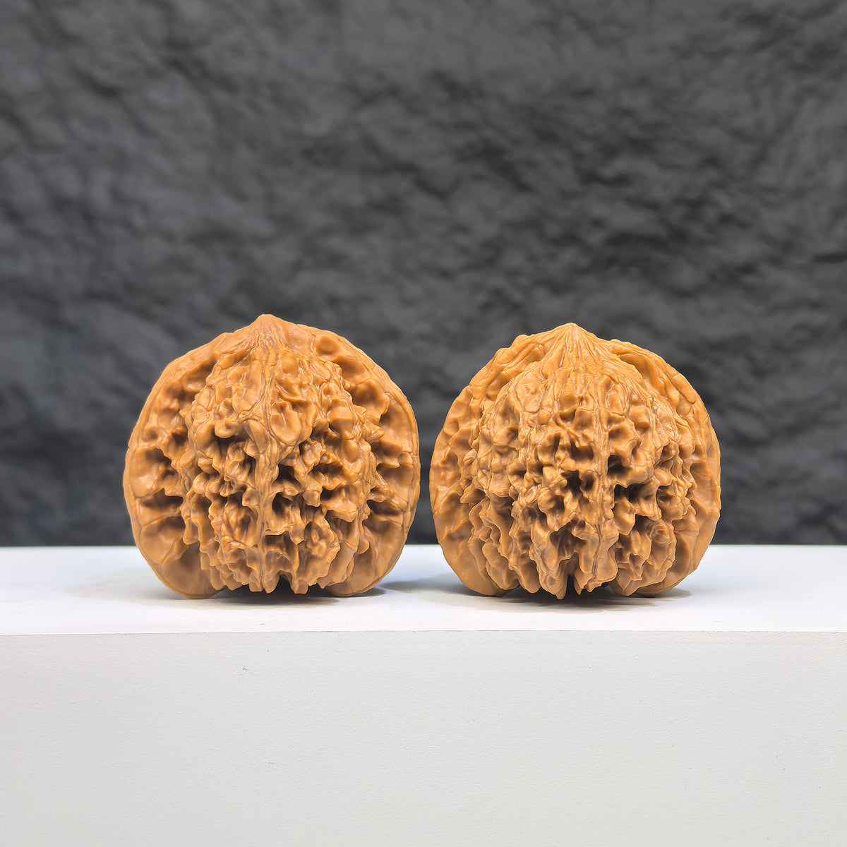 Pair of Babys Breath Full Stars Wenwan walnuts from Wenwan Art, featuring intricate star patterns and smooth 38mm size.