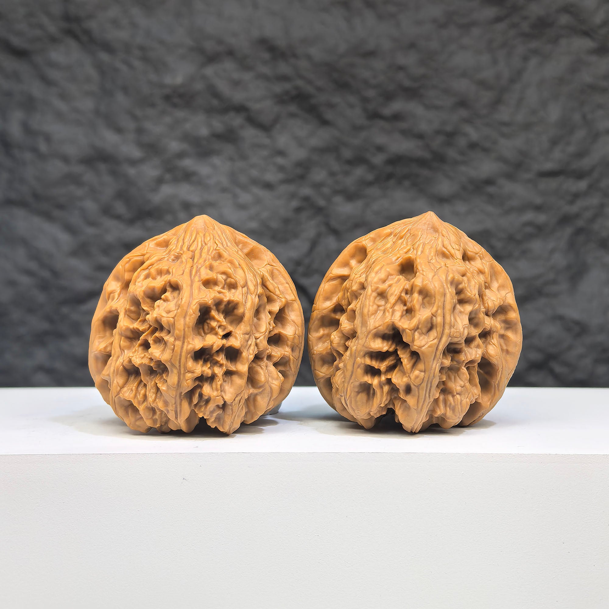 Selected grade Wild Bison Walnut Wenwan art piece, 4x4cm, showcasing natural walnut grain and smooth polished surface.