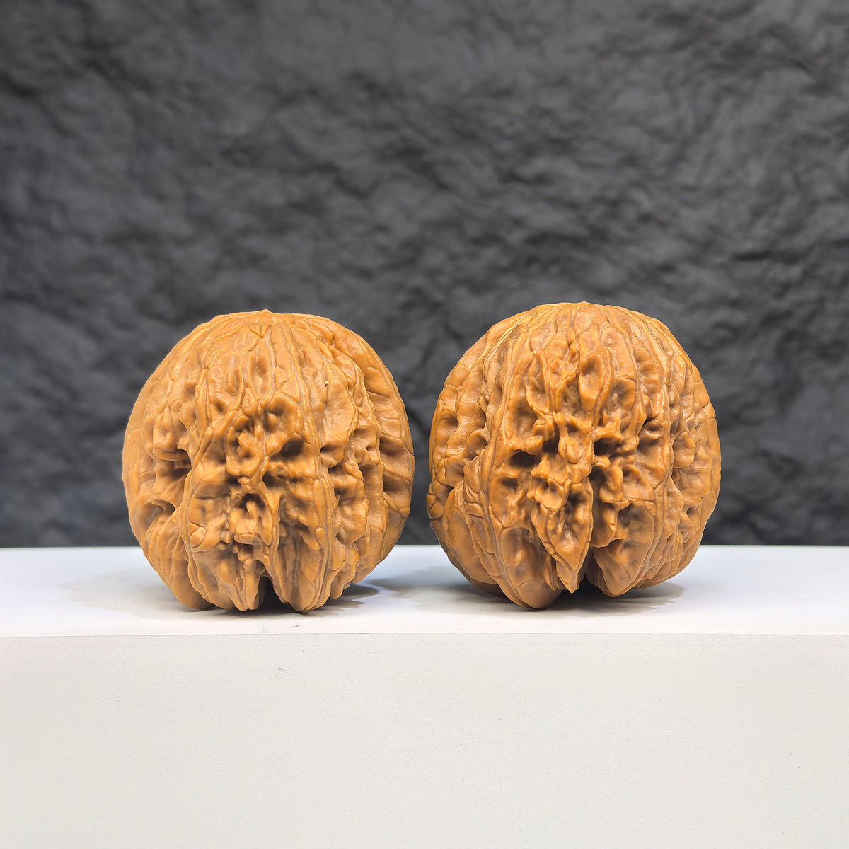 Selected grade Blizzard Wenwan Walnut, 4.1×4.4cm, showcasing smooth surface and natural wood grain, from Wenwan Art.