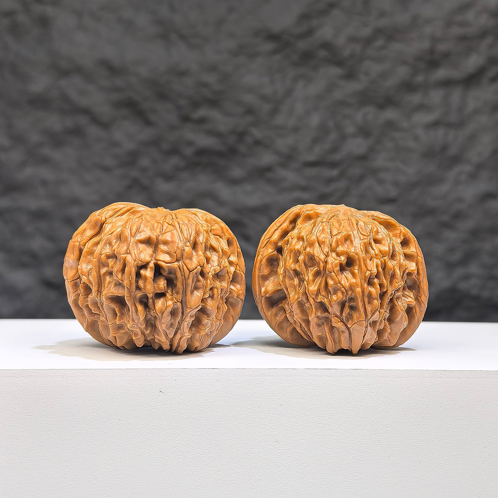 Pair of red shell Wenwan walnuts by Wenwan Art, featuring natural red shell and intricate milling patterns, 39mm x 38mm size.