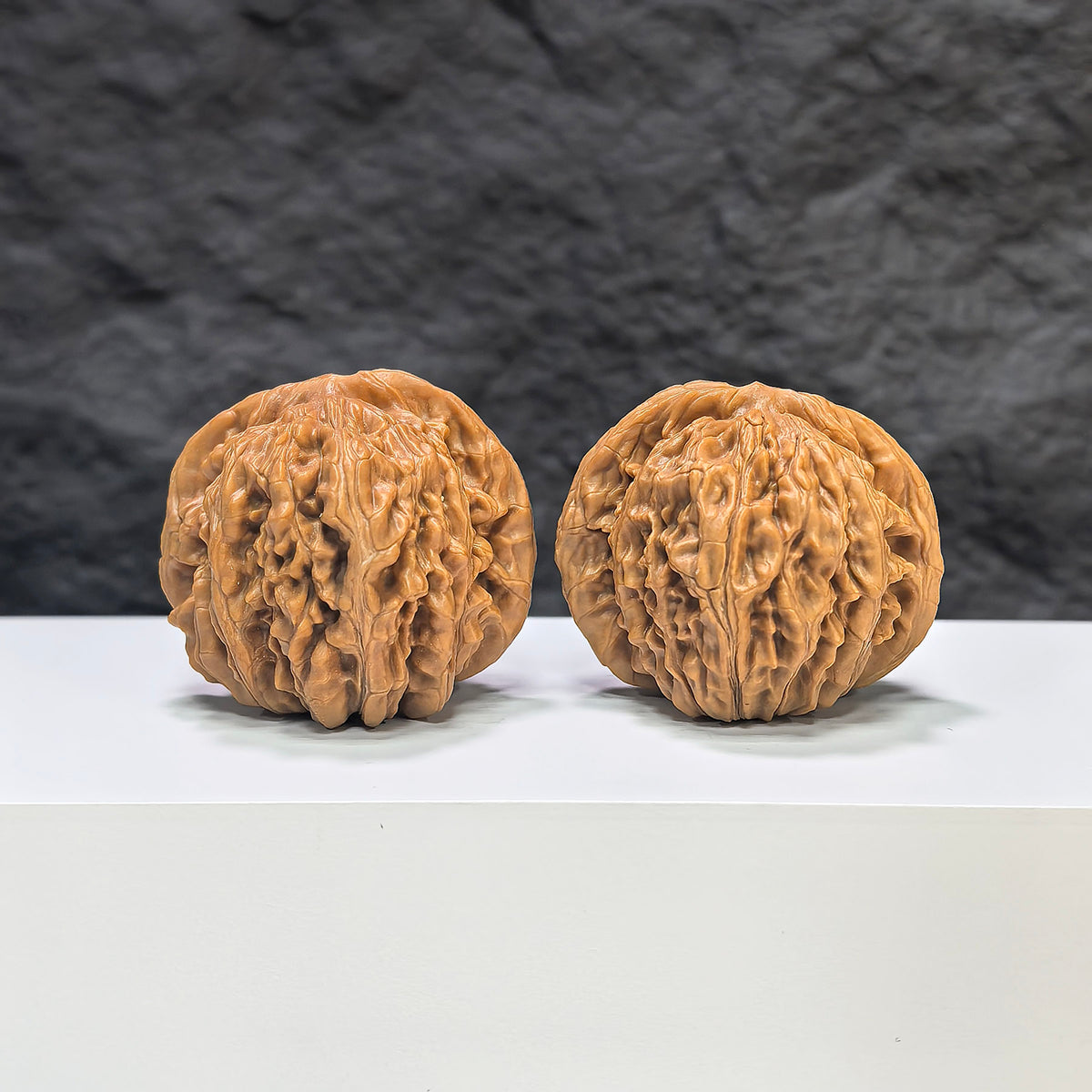 Selected grade Sizuolou Wenwan Walnut, 4.2x3.8cm, showing smooth, polished surface and rich natural wood grain details.
