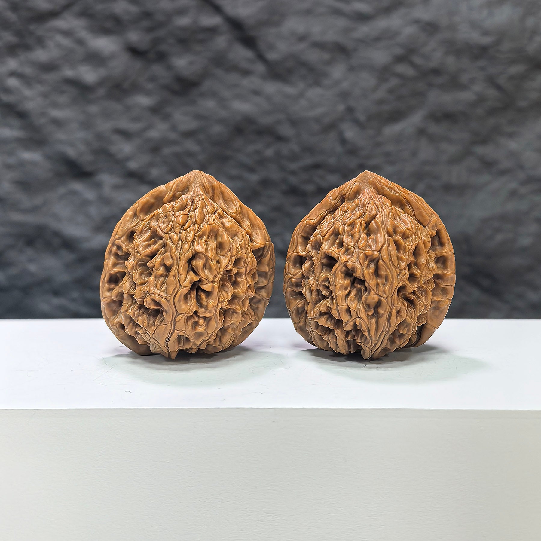 Pair of Wenwan Art Water Dragon Texture Classic Wenwan Walnuts, 37mm x 36mm, showcasing intricate water dragon design.