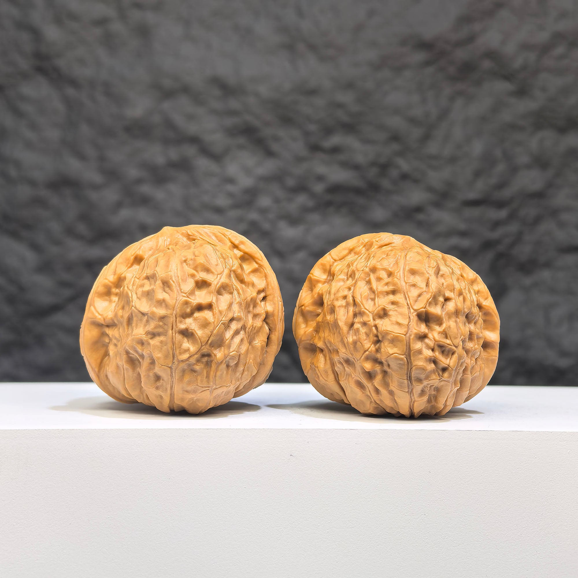 Pair of Small Pumpkin Pier Wenwan walnuts from Wenwan Art, 39mm x 42mm, showcasing detailed miniature walnut carvings.