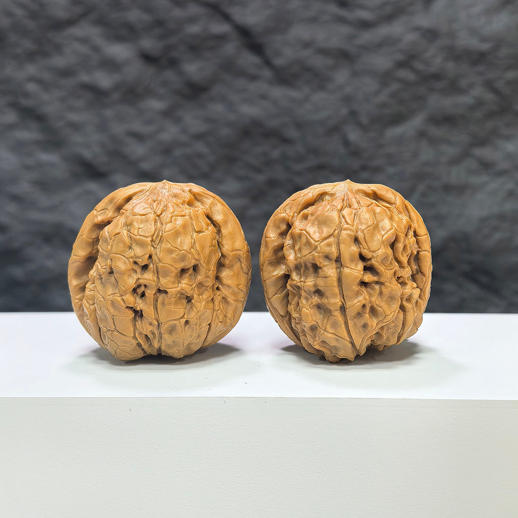 Pair of Classic Scholar Wenwan walnuts by Wenwan Art, hand-matched, 39mm size, featuring intricate 甲骨文 carvings.