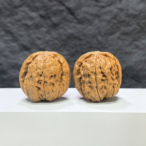 Pair of Classic Scholar Wenwan walnuts by Wenwan Art, hand-matched, 39mm size, featuring intricate 甲骨文 carvings.