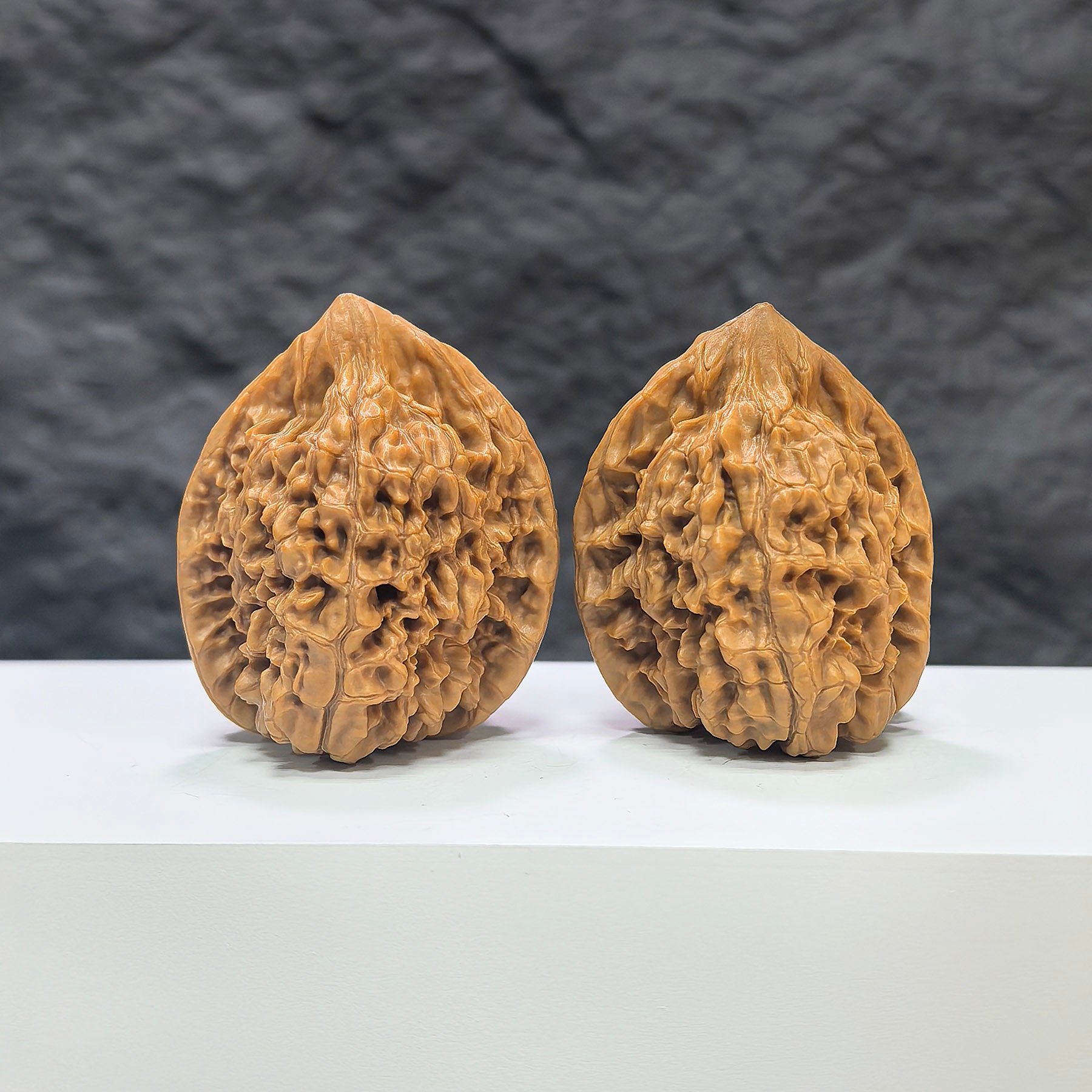 Pair of wild Wenwan walnuts from Wenwan Art, featuring authentic Wild Official Hat design, measuring 39x38mm, natural wood texture.