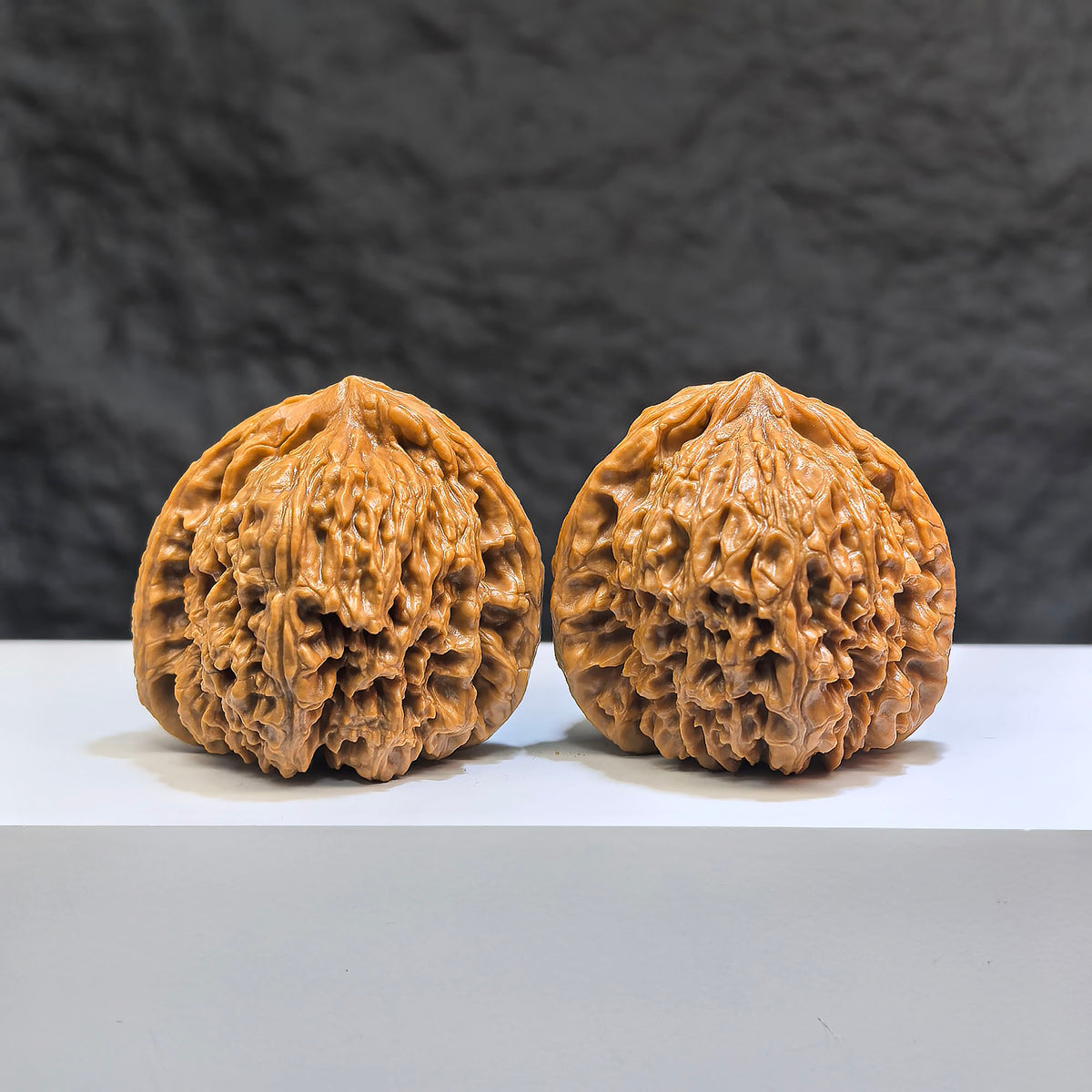 Pair of Classic Scholar Wenwan Walnuts from Wenwan Art, hand-matched with triangular concave base, 42mm size, featuring 南疆石 material.
