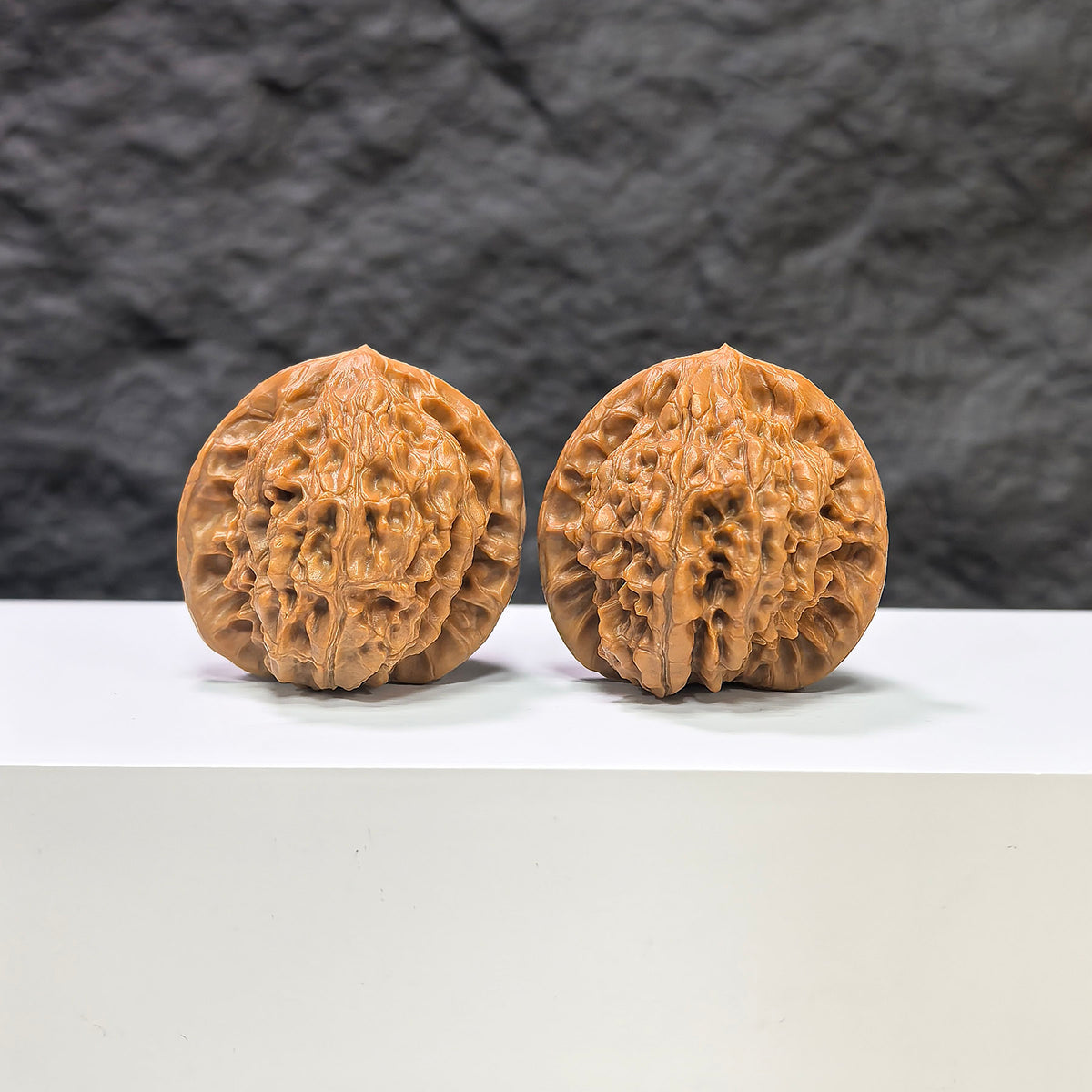 Pair of Golden Kylin Wenwan walnuts by Wenwan Art, 37mm x 36mm, showcasing the detailed carved golden kylin design.