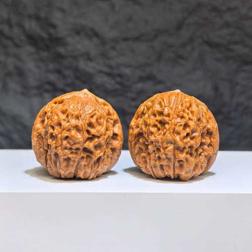Pair of ZenWenwan Classic Scholar Wenwan walnuts, hand-matched with 35mm and 36mm size, showcasing detailed wood grain and craftsmanship.