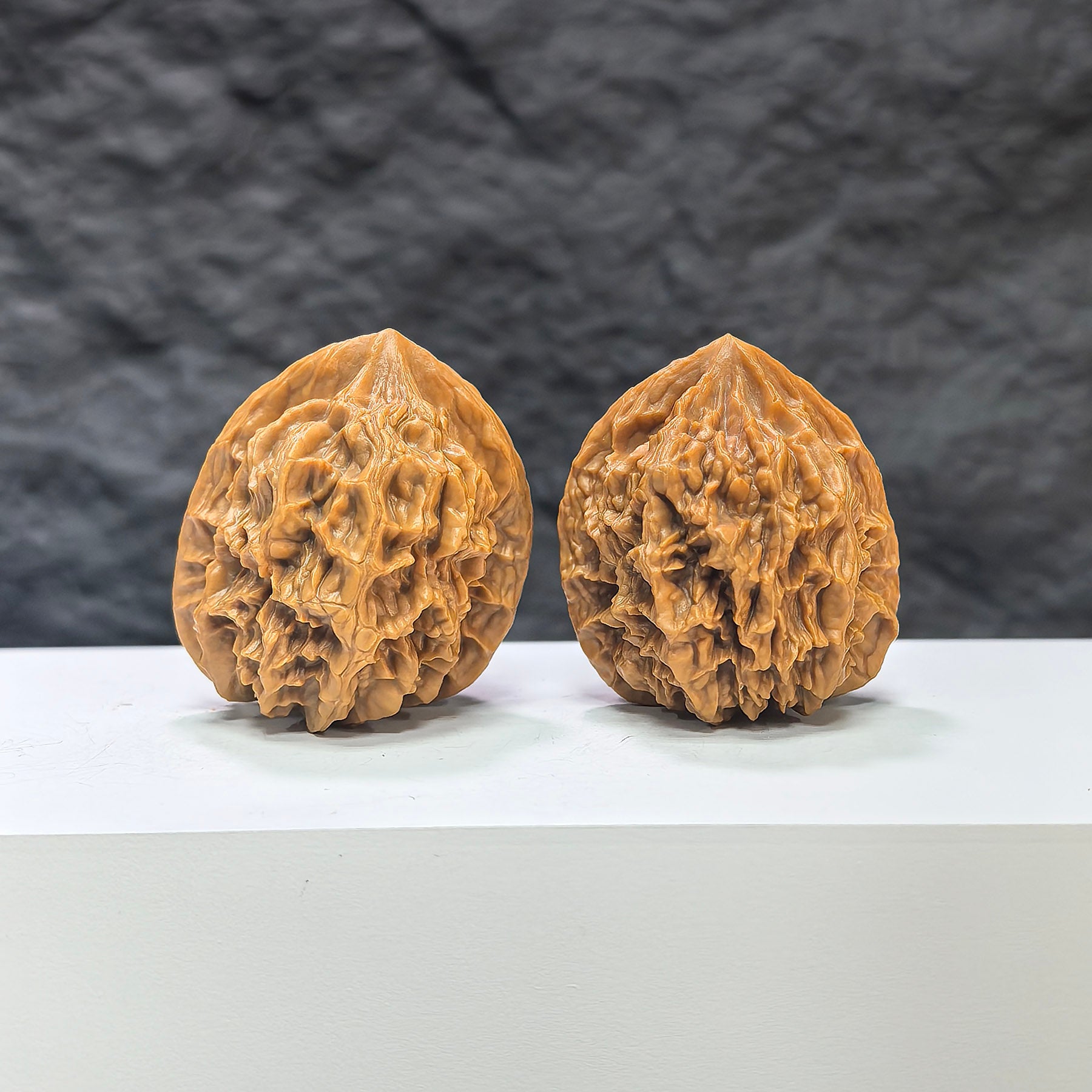 Pair of Dragon Scale Wenwan walnuts by Wenwan Art, 36mm size, showcasing detailed dragon scale pattern and smooth polished surface.