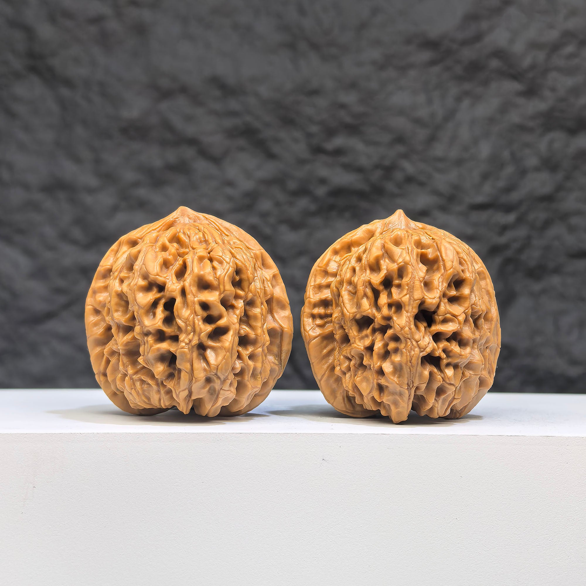 Pair of Wenwan Art Hundred Beasts Lion Head Wenwan walnuts, 38mm size, featuring detailed lion head carvings.