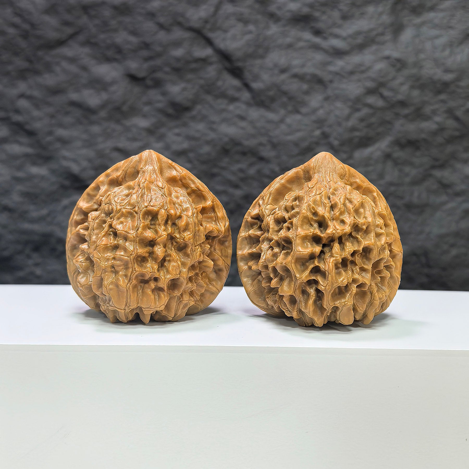 Pair of official Wenwan Walnuts from Wenwan Art, classic walnut shape with detailed natural wood grain, 44mm x 42mm size.