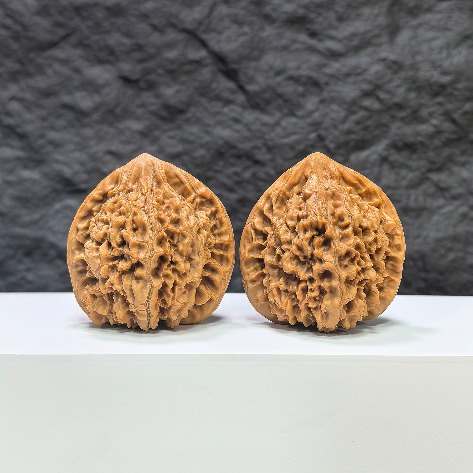Pair of large Wenwan Art official Wenwan walnuts, premium 45mm x 41mm size, showcasing smooth, polished walnut surfaces.