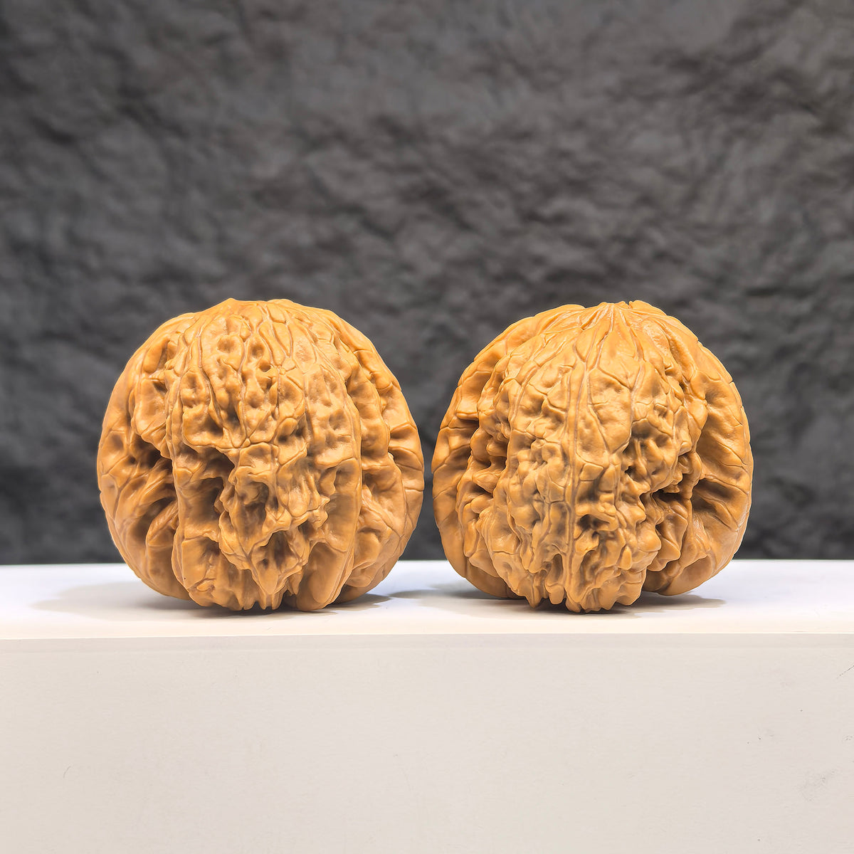 Selected grade Blizzard Wenwan Walnut, 4.3 × 4.4cm, showcasing smooth, polished surface and natural wood grain details.