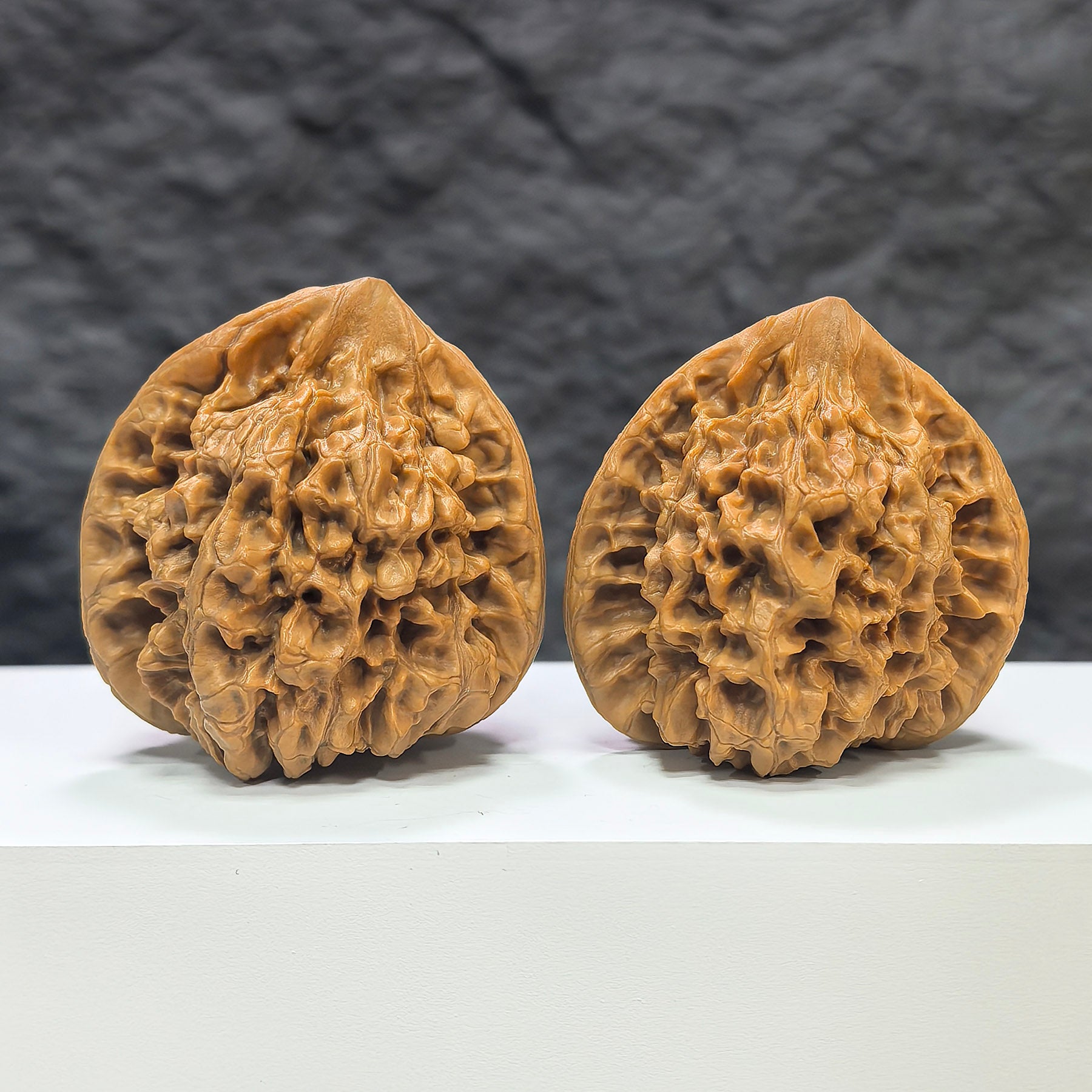 Pair of large Wenwan Walnut art pieces from Wenwan Art, featuring detailed natural walnut surfaces, each approximately 47mm by 43mm.