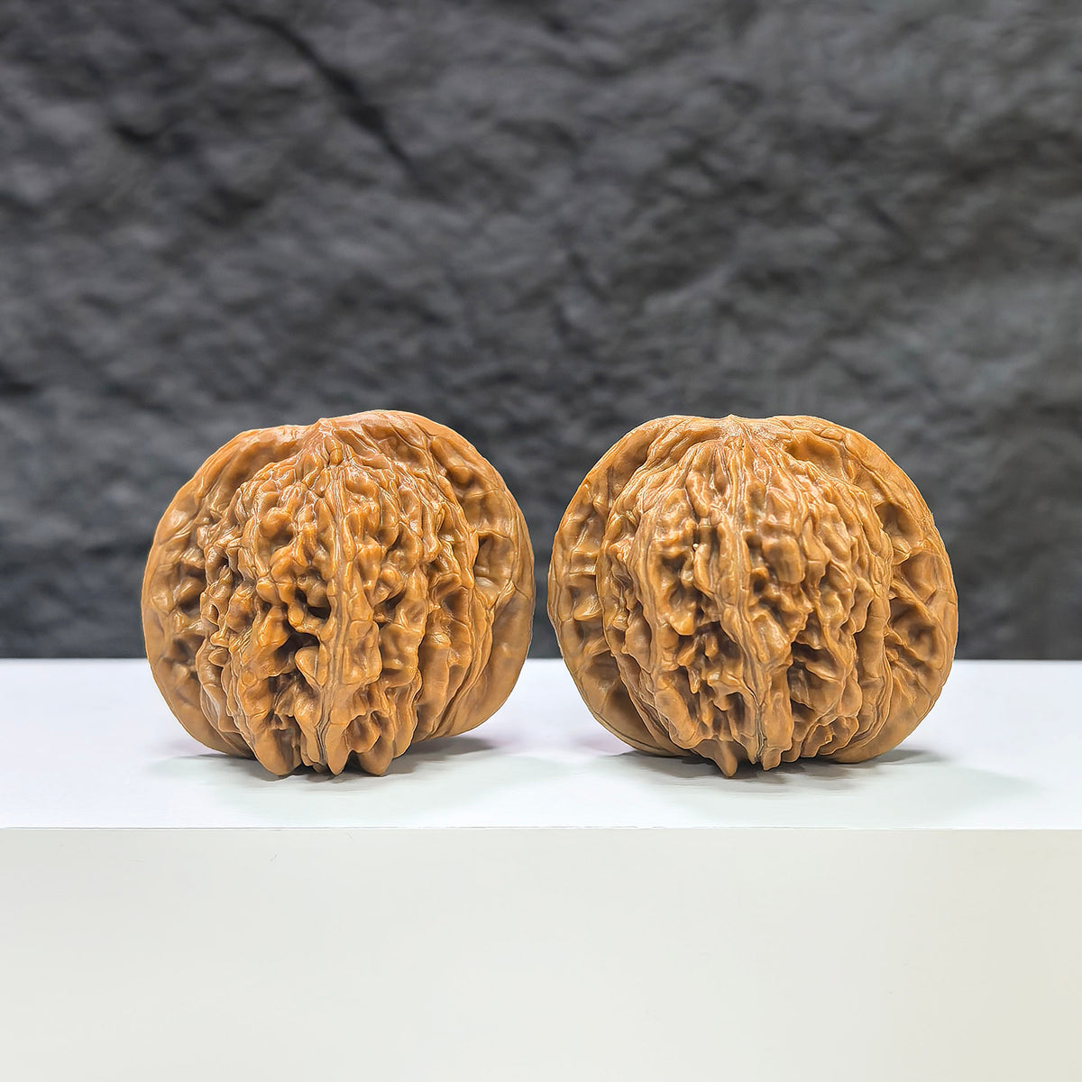 Pair of Sizuolou Classic Wenwan walnuts from Wenwan Art, showcasing detailed natural walnut carvings, 42mm x 38mm size.