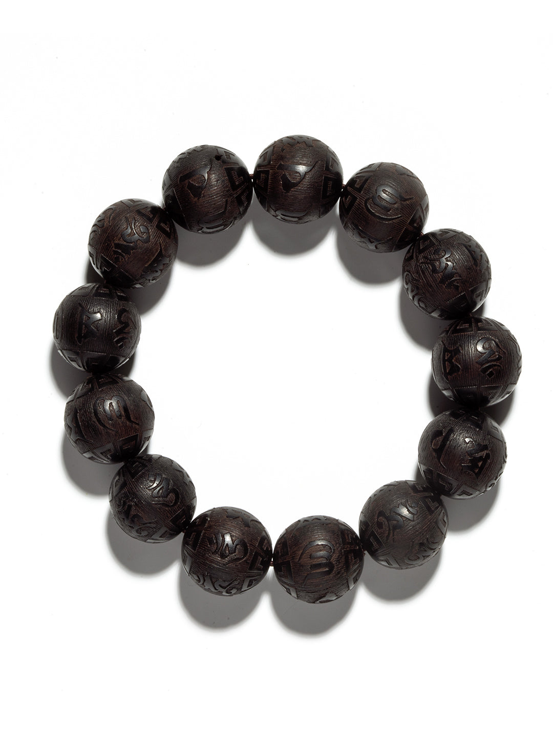 Carved ebony wood Om Mani Padme Hum bracelet with 16mm beads, featuring intricate Buddhist mantra carvings, by ZenWenwan.
