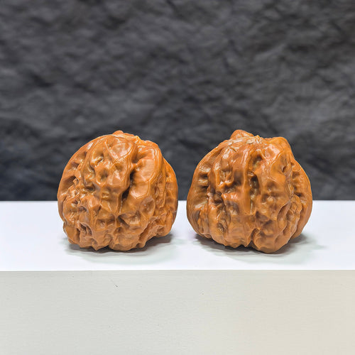 Pair of Classic Scholar Wenwan Walnuts from Wenwan Art, hand-matched with 蟾蜍水晶蛙 design, 36mm x 42mm size.