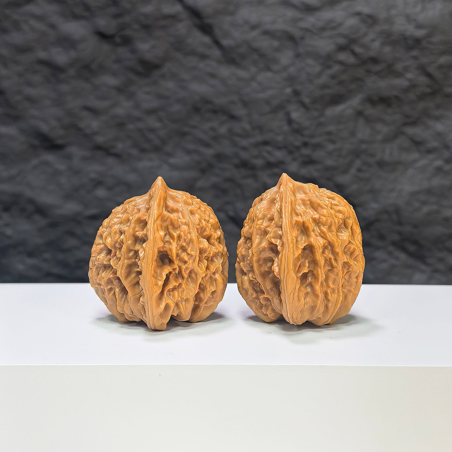 Pair of Xiayunling Classic Wenwan Walnuts from Wenwan Art, 36mm size, showcasing detailed natural walnut patterns and smooth surfaces.