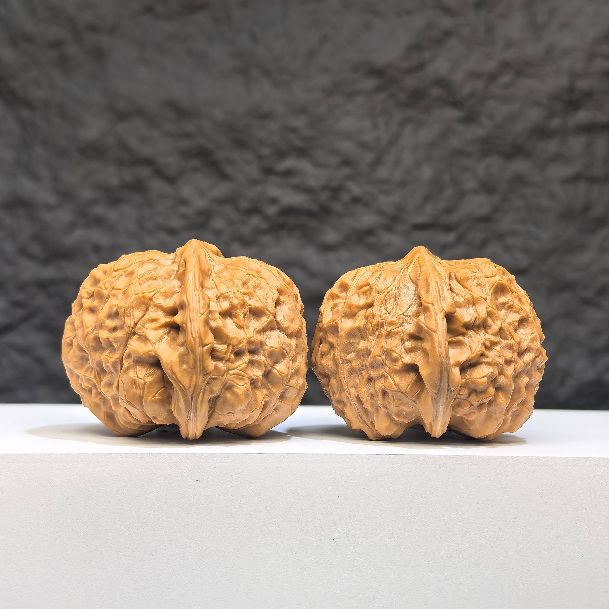 Wenwan Art Pumpkin Pier Classic Wenwan Walnut pair with carved pumpkin design, measuring 41mm x 44mm, detailed natural stone carvings.