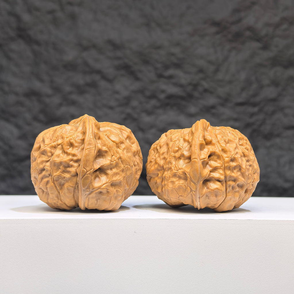 Pair of Small Pumpkin Pier Wenwan Walnuts from Wenwan Art, miniature walnut carvings measuring 39mm by 42mm.