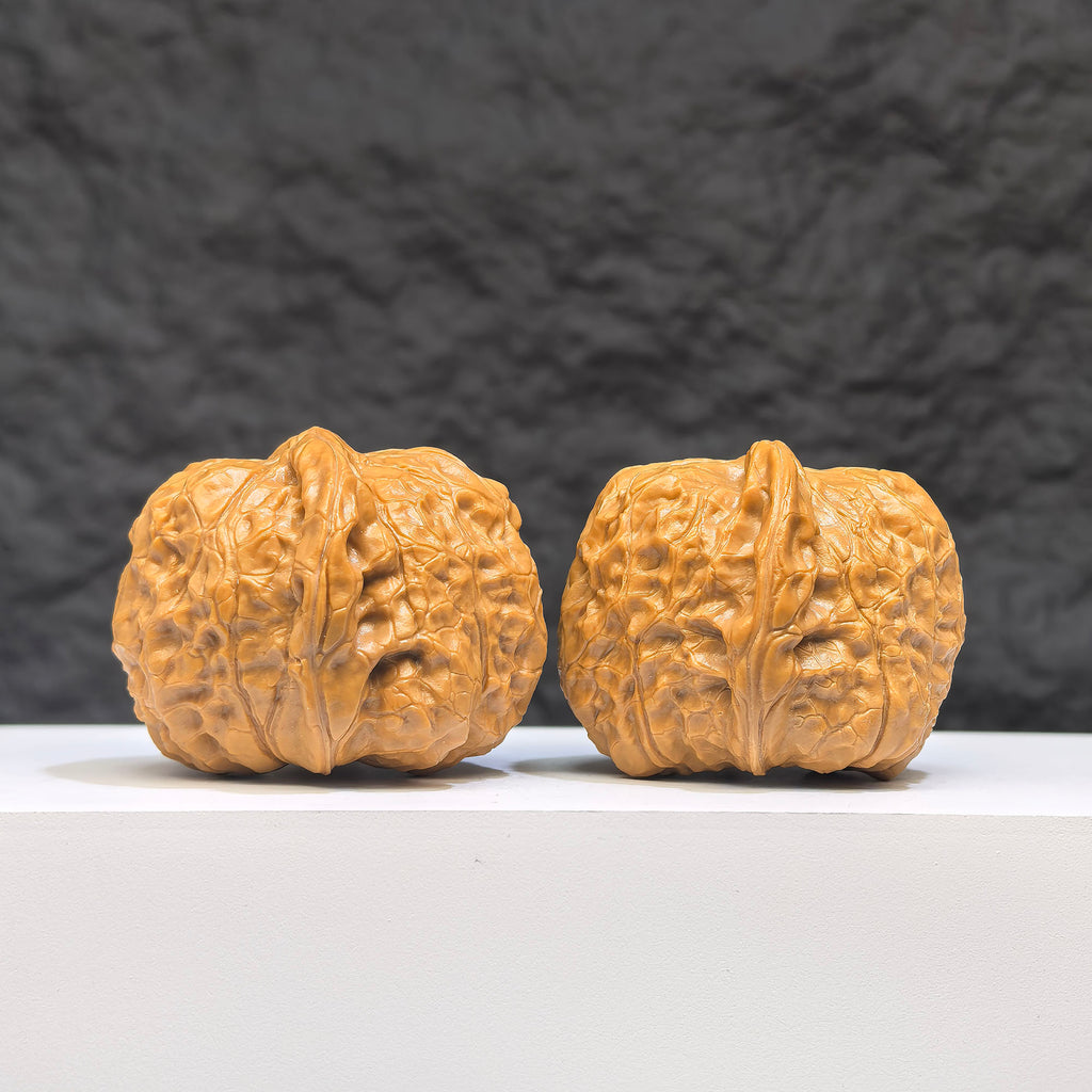 Wenwan Art Pumpkin Pier Classic Wenwan Walnut pair with carved pumpkin design, measuring 40x42mm, featuring detailed craftsmanship.