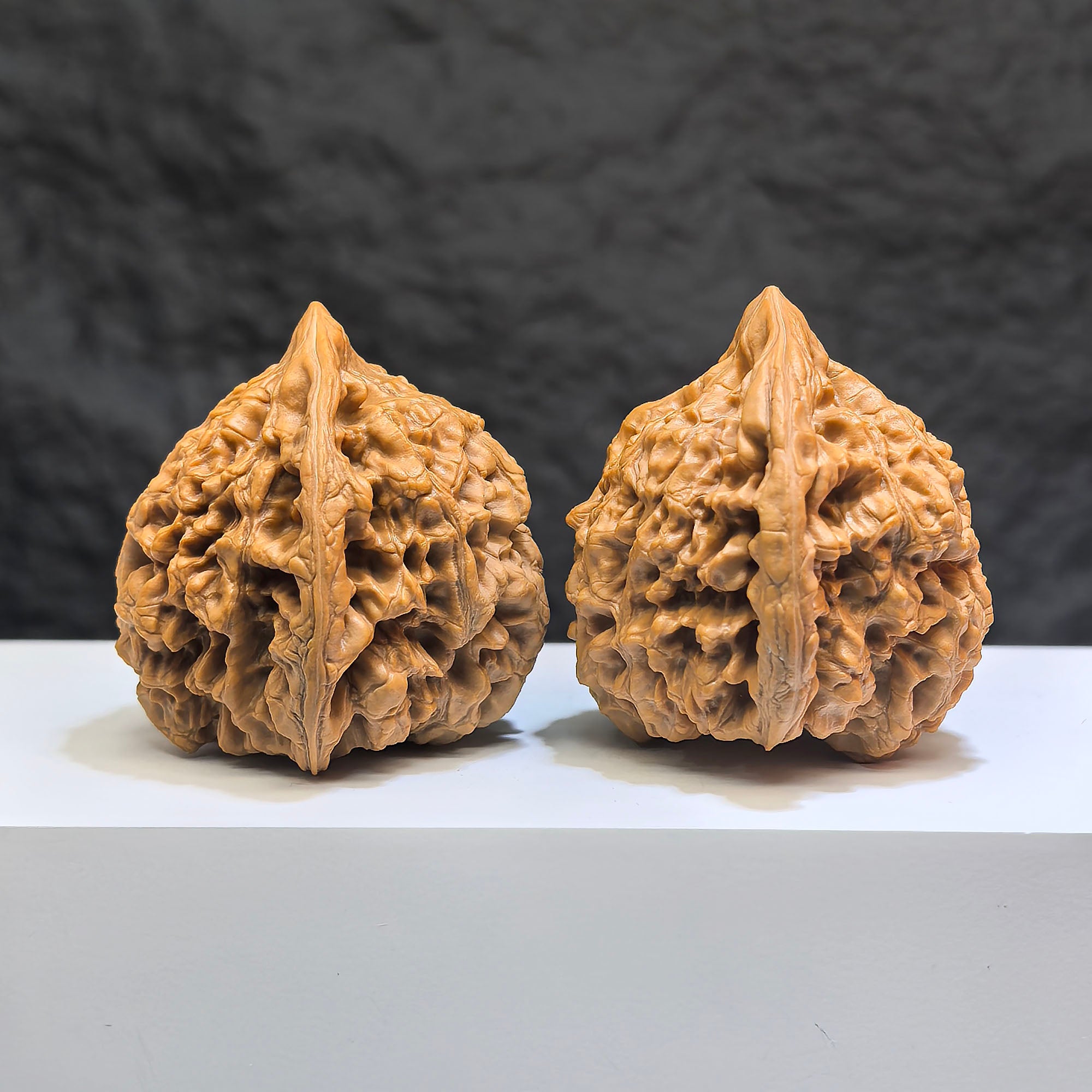 Pair of Classic Scholar Wenwan Walnuts by Wenwan Art, featuring 麒麟紋凹底 design, 47mm x 44mm, showcasing detailed craftsmanship.