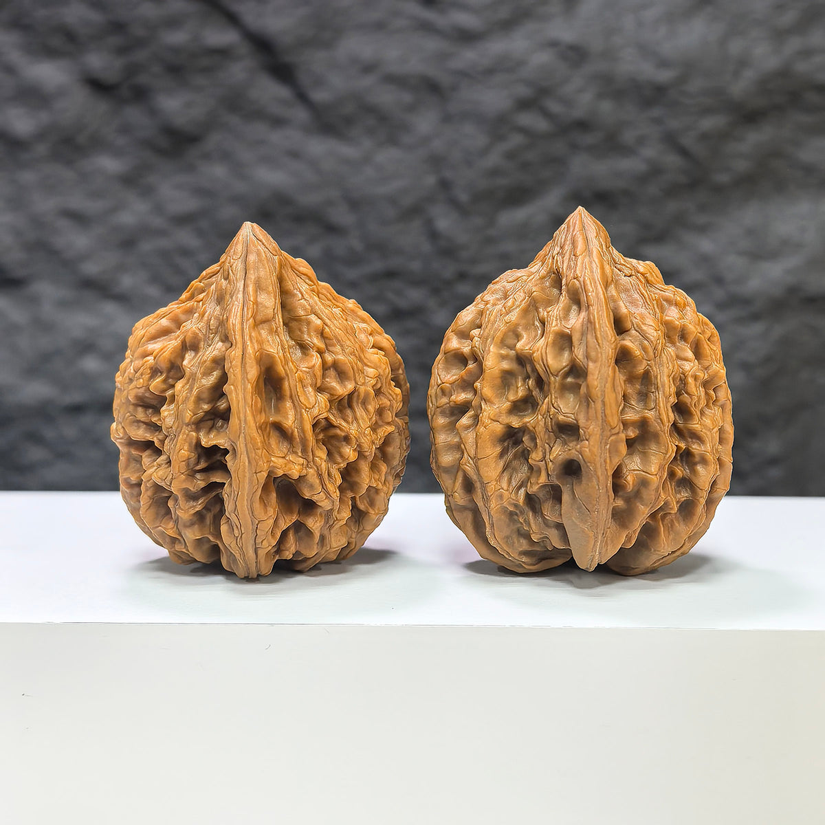 Pair of Sizuolou Classic Wenwan Walnuts from Wenwan Art, 41mm x 40mm, showcasing smooth, polished walnut carvings.