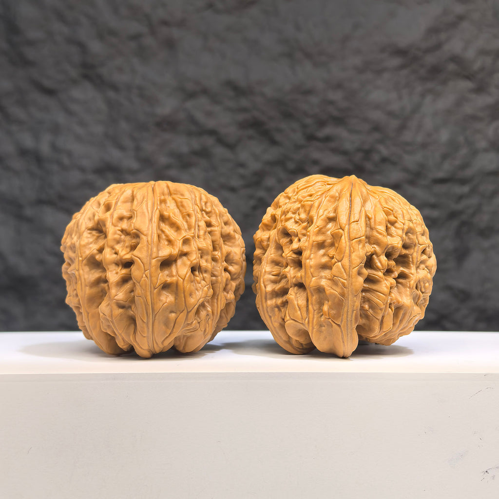 Selected grade Blizzard Wenwan Walnut, 4.3×4.4cm, showcasing smooth texture and natural wood grain from Wenwan Art.