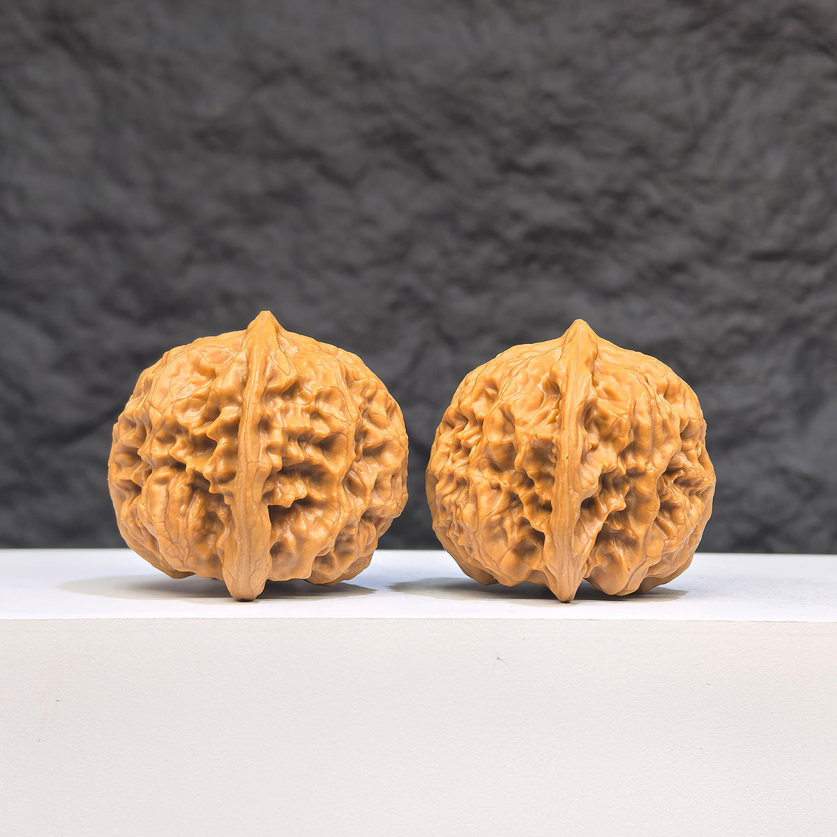 Authentic Wild Wenwan Walnut pair from Wenwan Art, featuring natural wood grain and size 33.0mm x 36.0mm, Wild Wolf design.