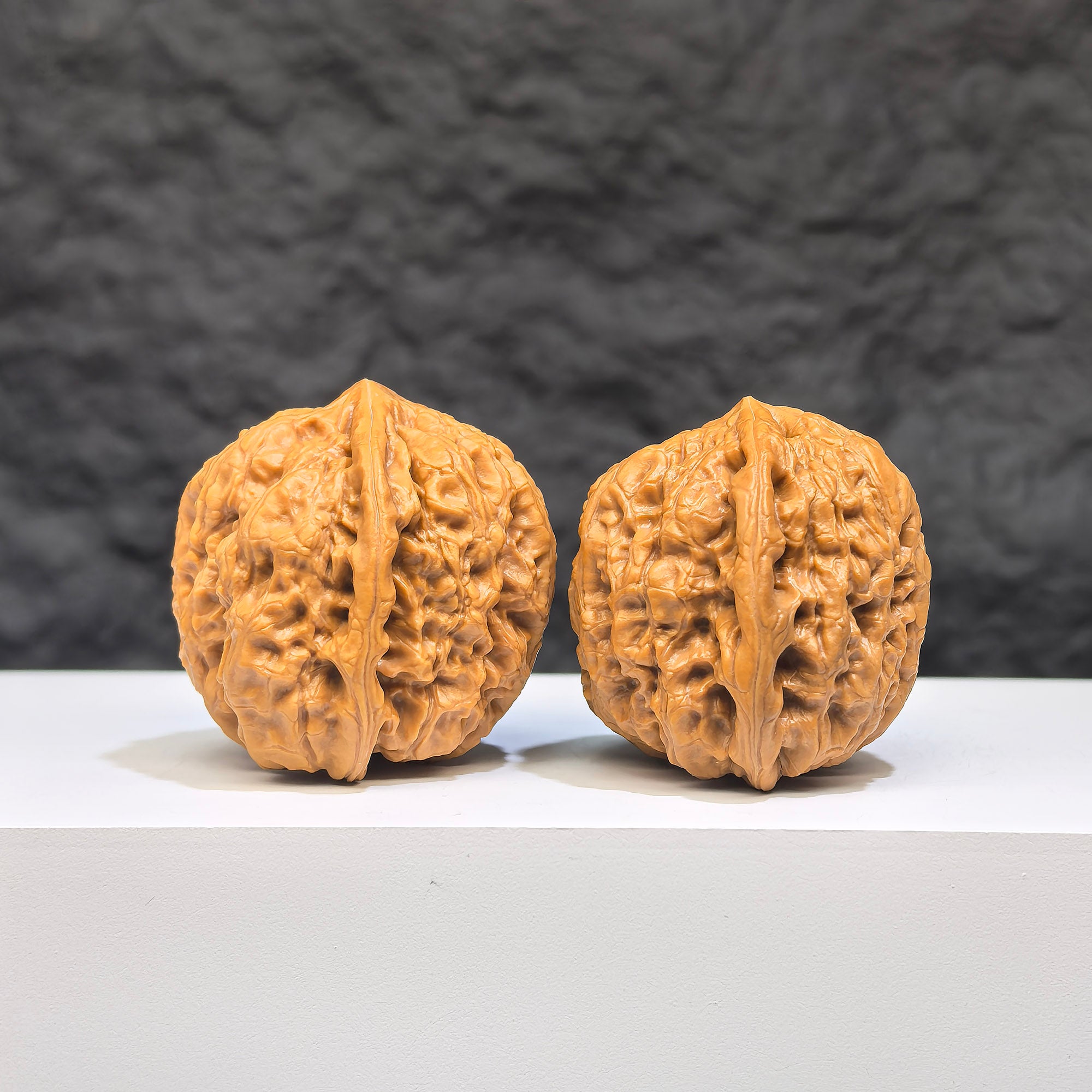 Miniature Wenwan Walnut pair, Pocket Yuhua Stone, Wenwan Art brand, 34mm x 33mm, detailed natural stone carvings.