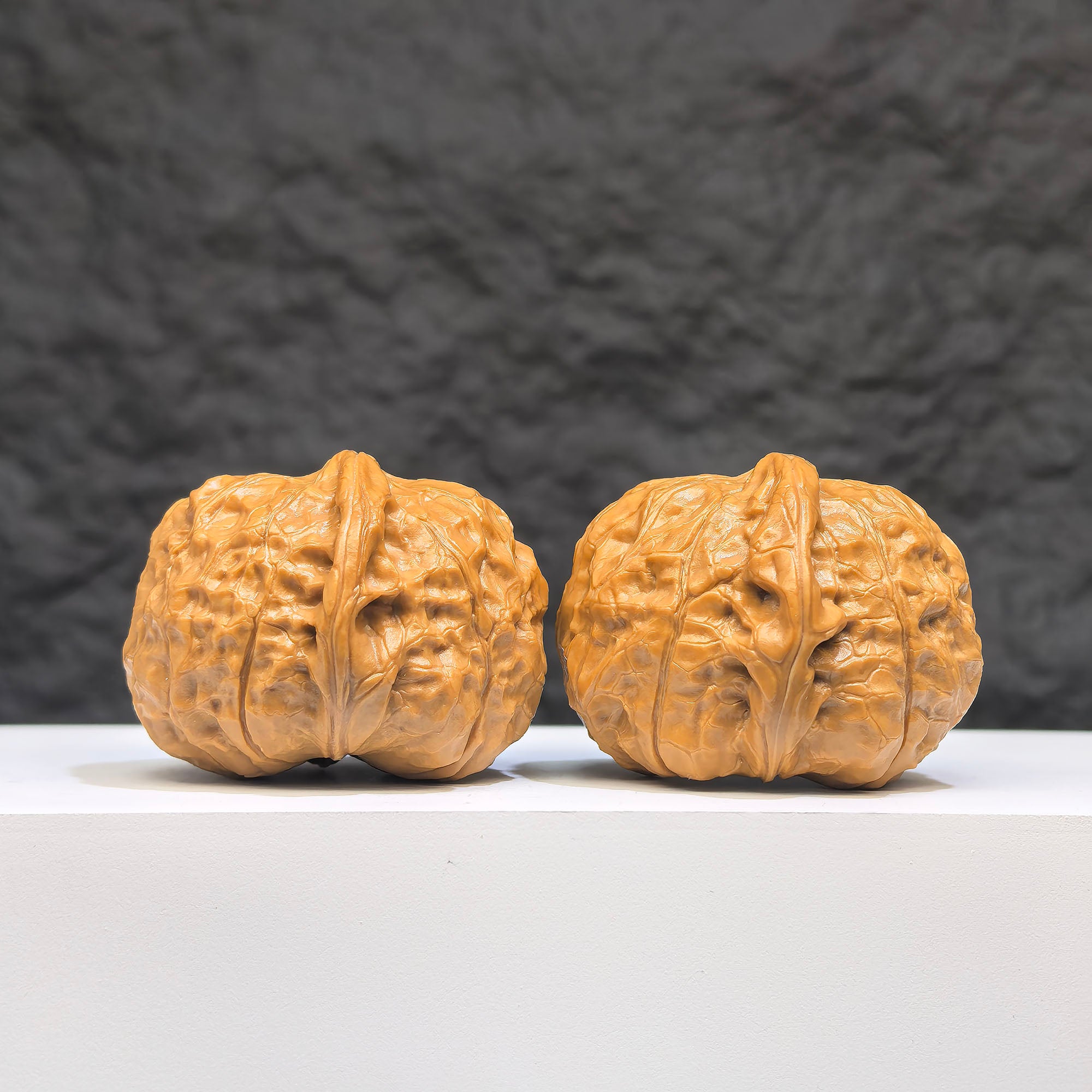 Pair of small Wenwan Walnut miniature pumpkin pier from Wenwan Art, measuring 38x40mm, with intricate natural wood grain details.