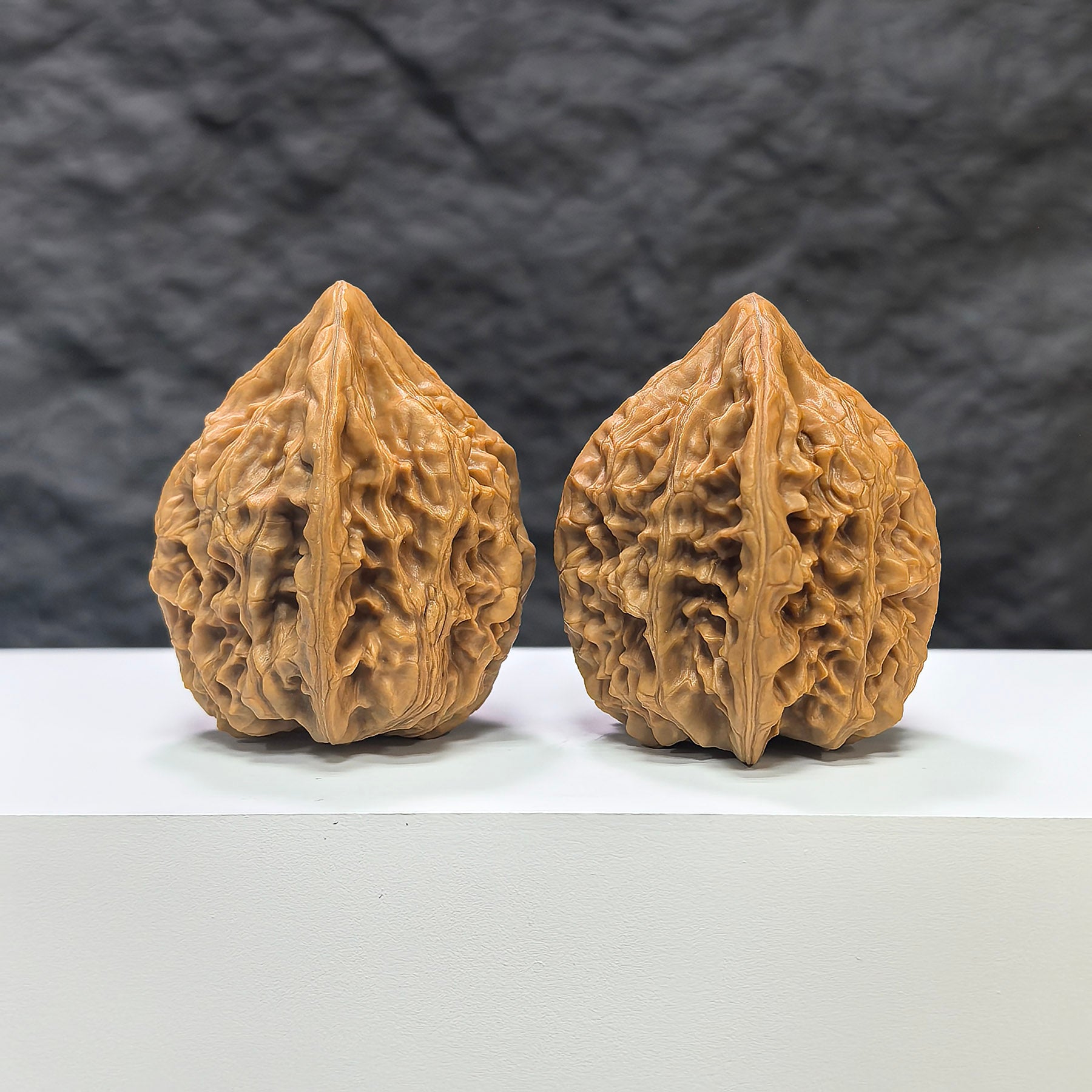 Pair of Beijing Chicken Heart Wenwan walnuts by Wenwan Art, showing 41mm x 40mm walnuts with rich, natural wood grain.