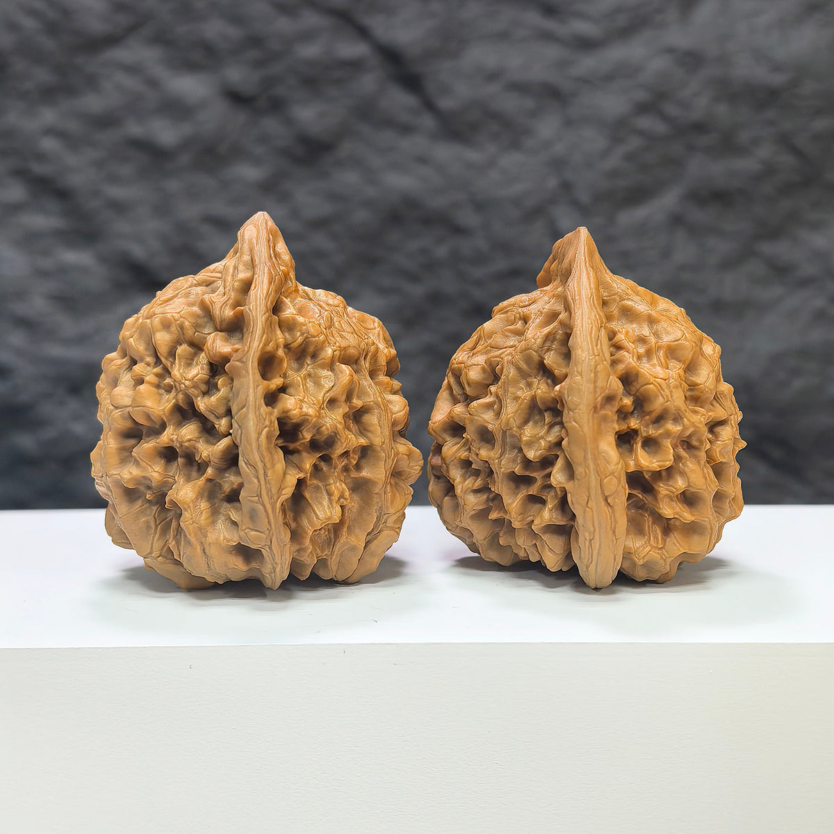 Pair of large Wenwan Art official Wenwan walnuts, 47mm x 43mm, showcasing smooth, polished walnut shells in natural brown tones.