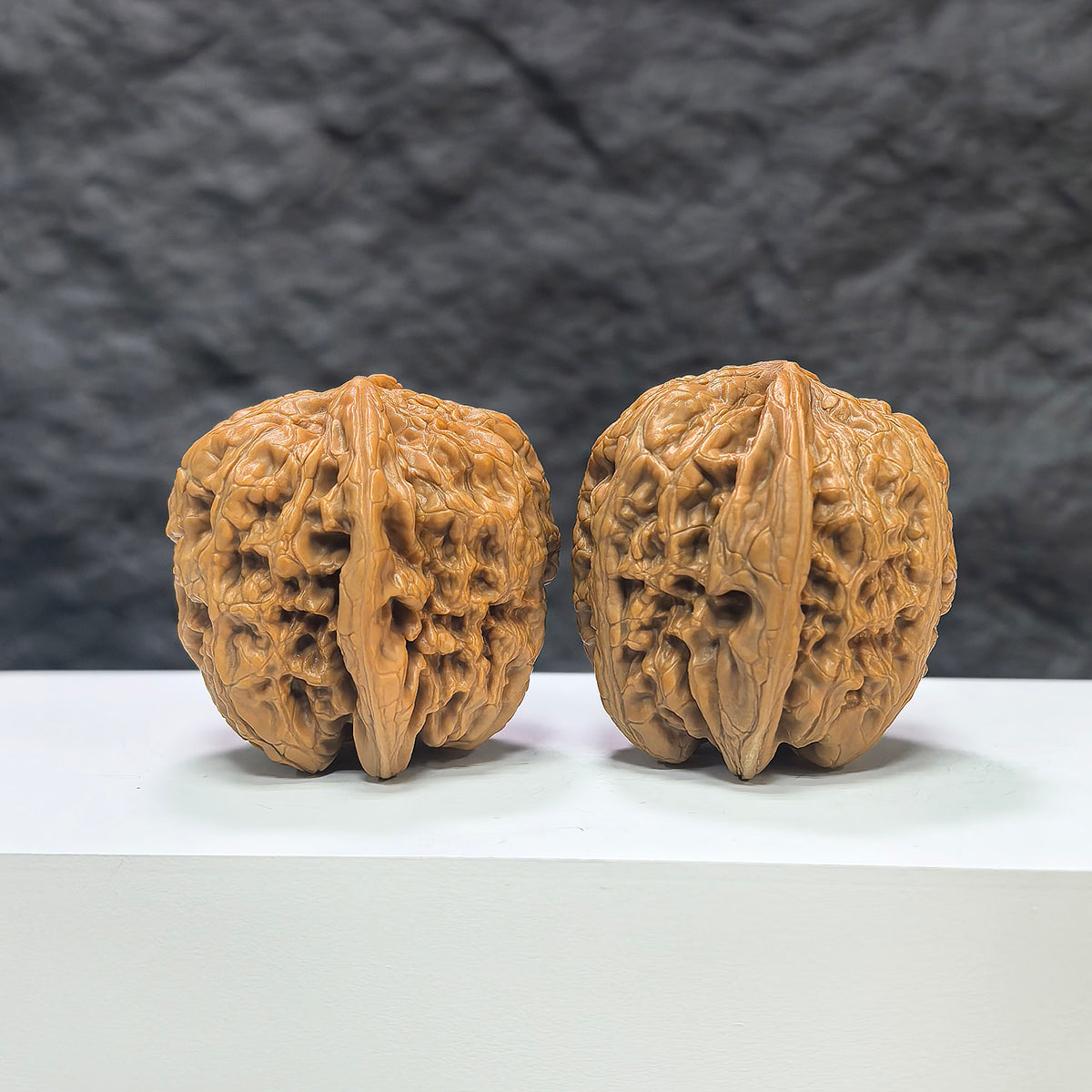Pair of North China General Shoulder Wenwan Walnuts from Wenwan Art, 40mm, showcasing smooth, polished walnut pairs with intricate natural patterns.
