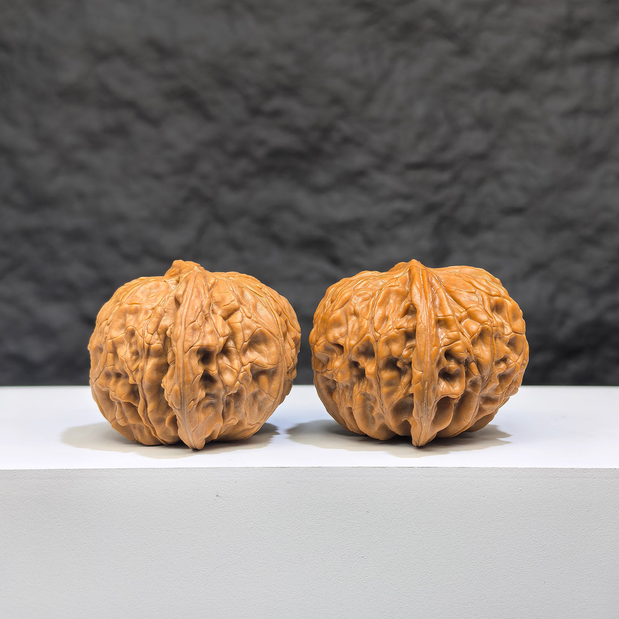 Pair of authentic Wild Millstone Wenwan walnuts from Wenwan Art, featuring natural wild walnut shells with intricate patterns.