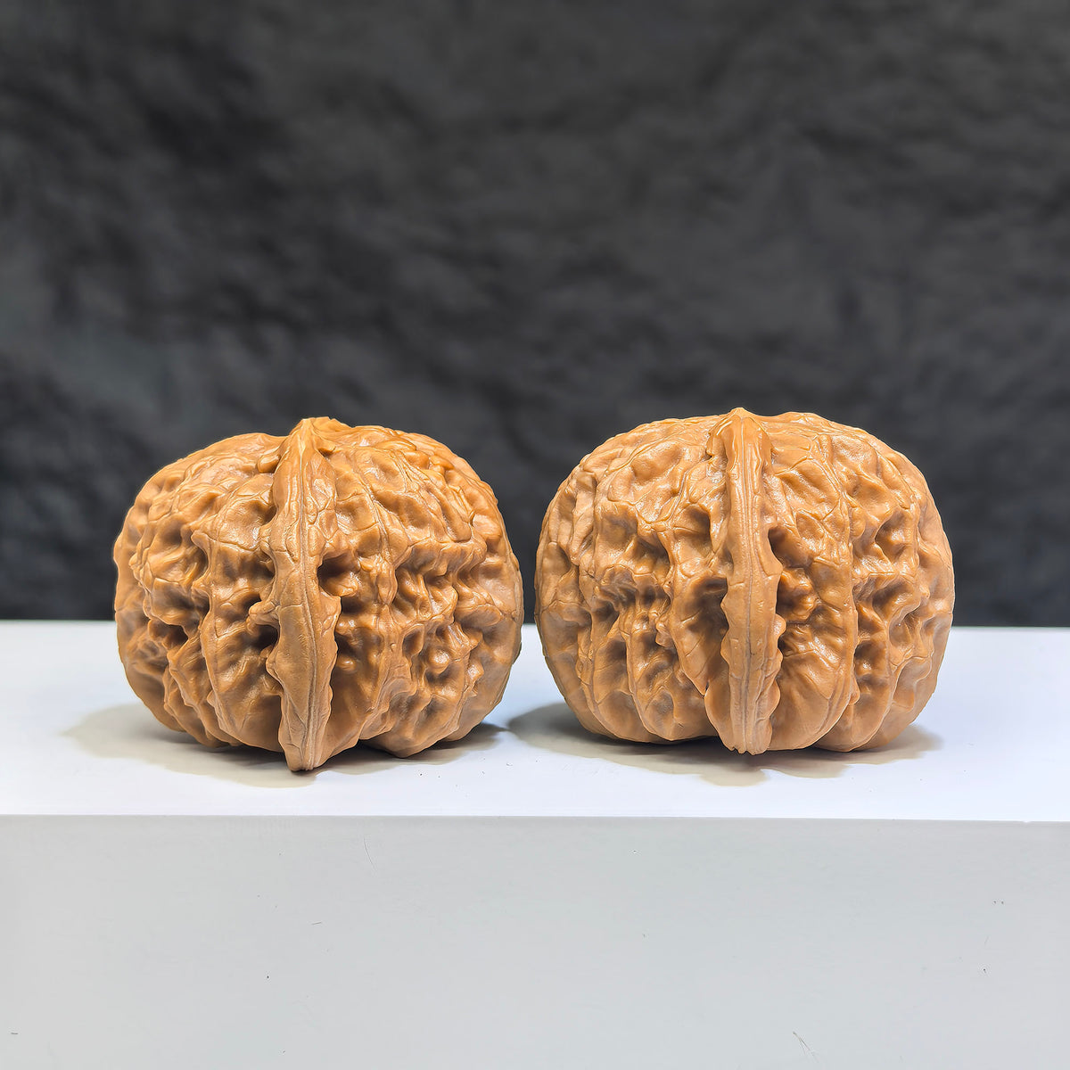 Pair of spherical white lion Wenwan walnuts from Wenwan Art, round-profile, 38mm size, featuring detailed white lion carvings.