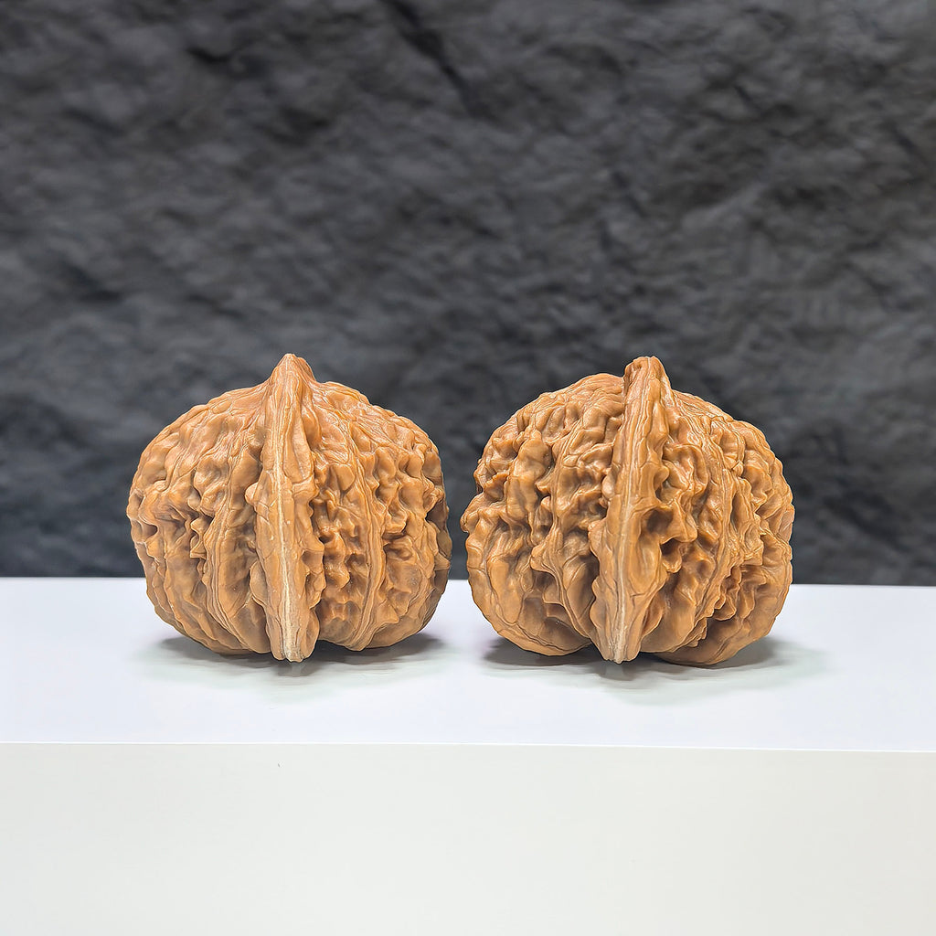 Pair of Sizuolou Wenwan walnuts from Wenwan Art, classic 41mm x 42mm walnut art pieces with intricate natural patterns.