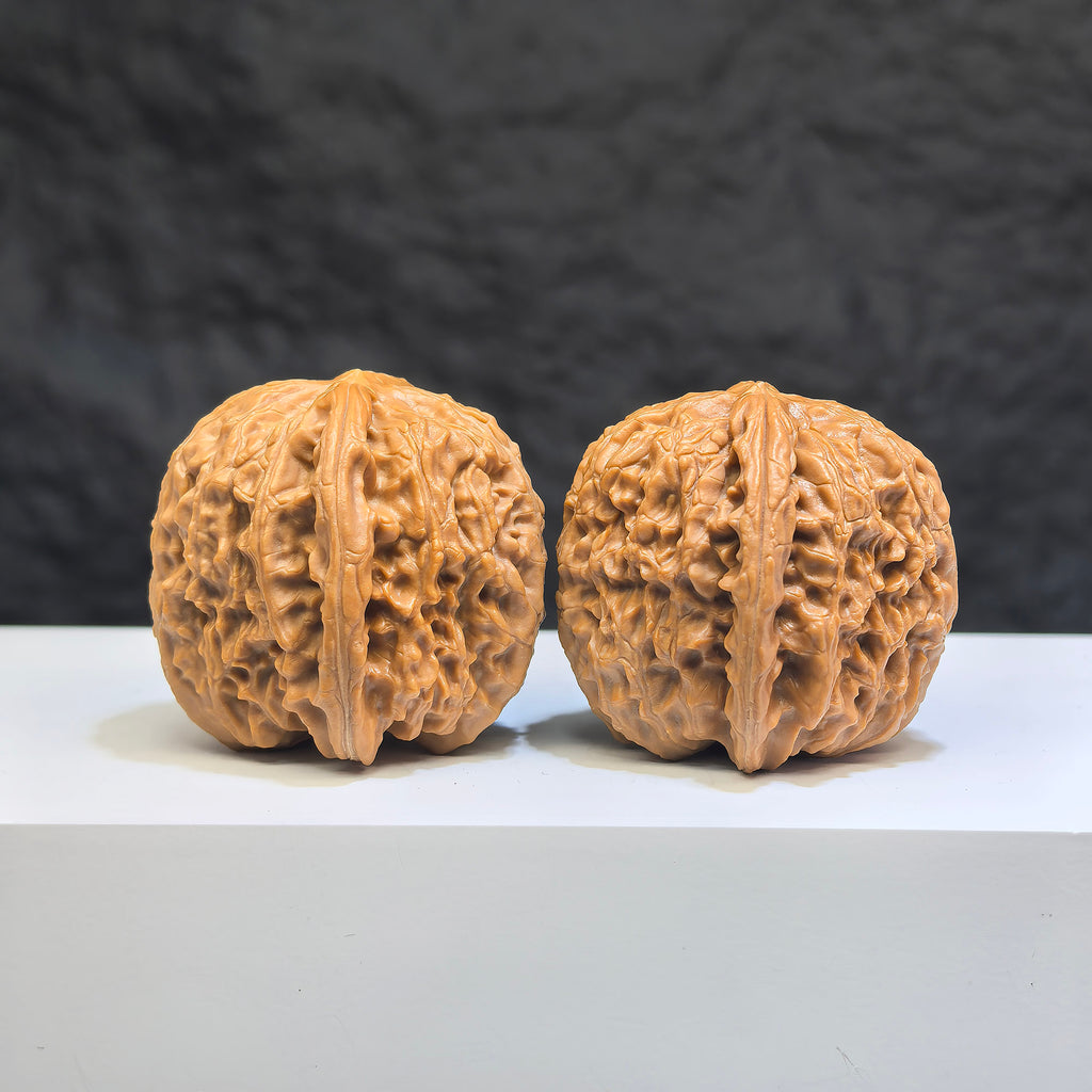 White Lion Wenwan Walnut pair by Wenwan Art, 36mm classic Chinese collectible walnuts with intricate carvings and natural wood grain.