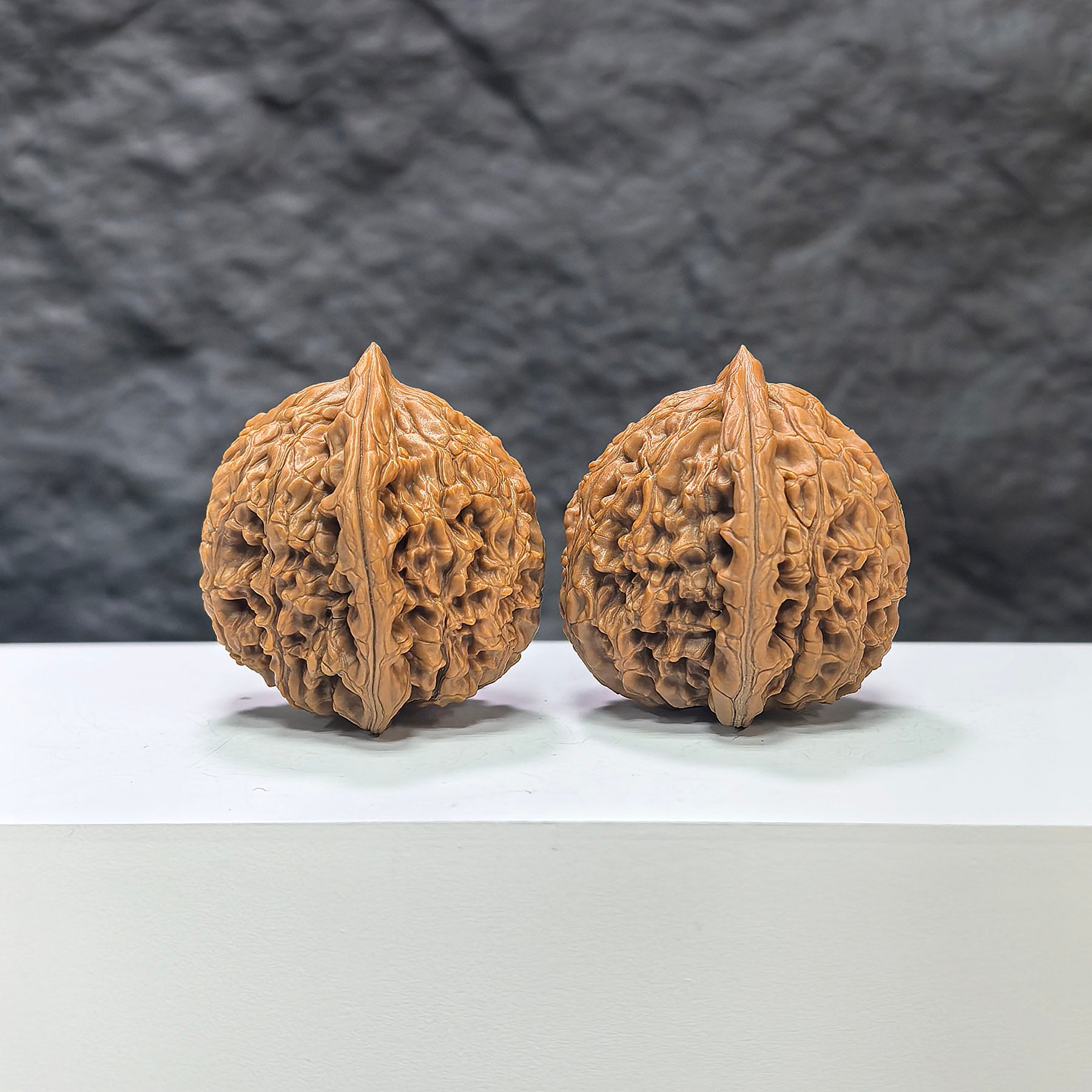 Pair of Wenwan Art Water Dragon Texture classic Wenwan walnuts with intricate water dragon design, measuring 37mm by 36mm.