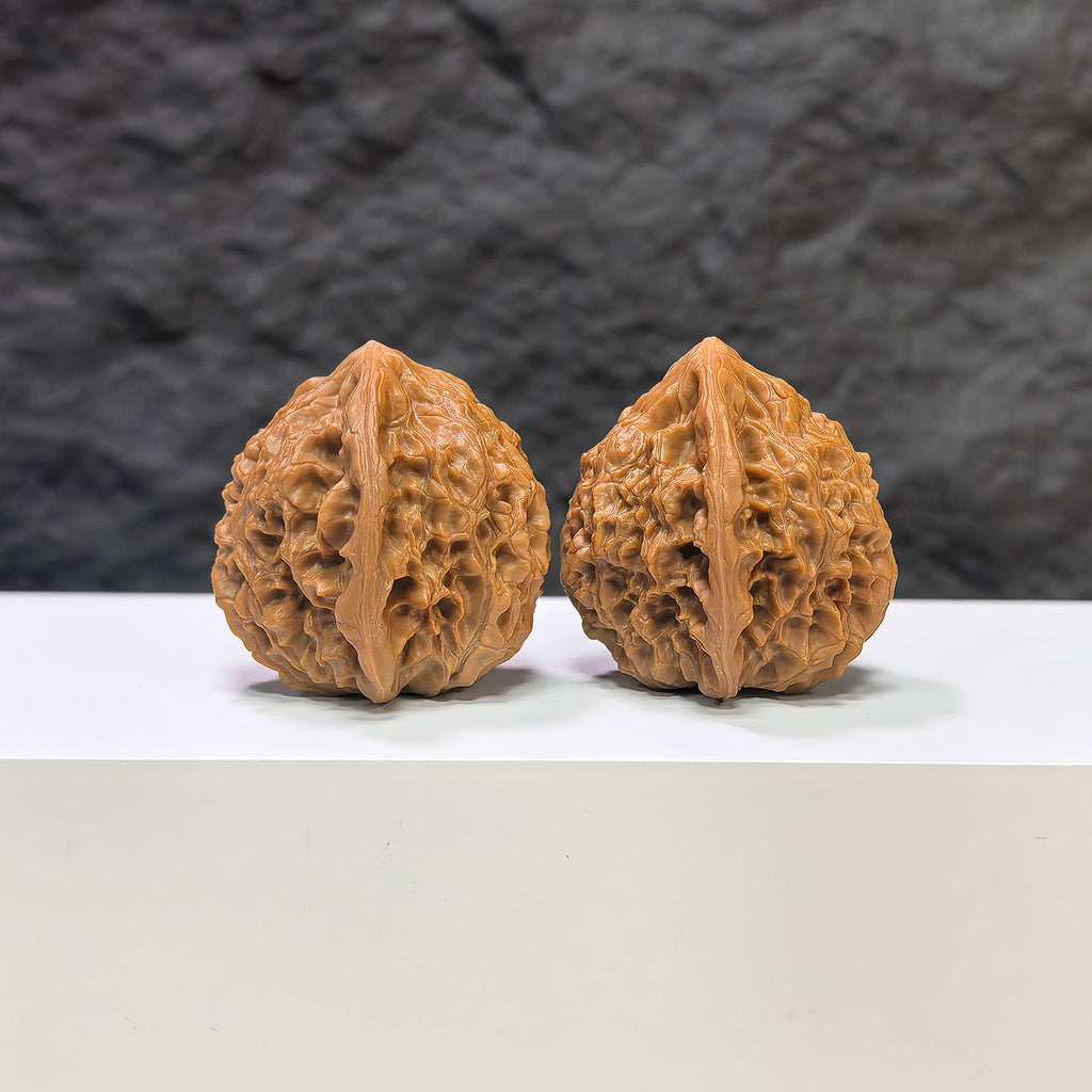 Golden Kylin Wenwan Walnut pair by Wenwan Art, 37mm x 36mm, featuring detailed carvings and rich golden color.